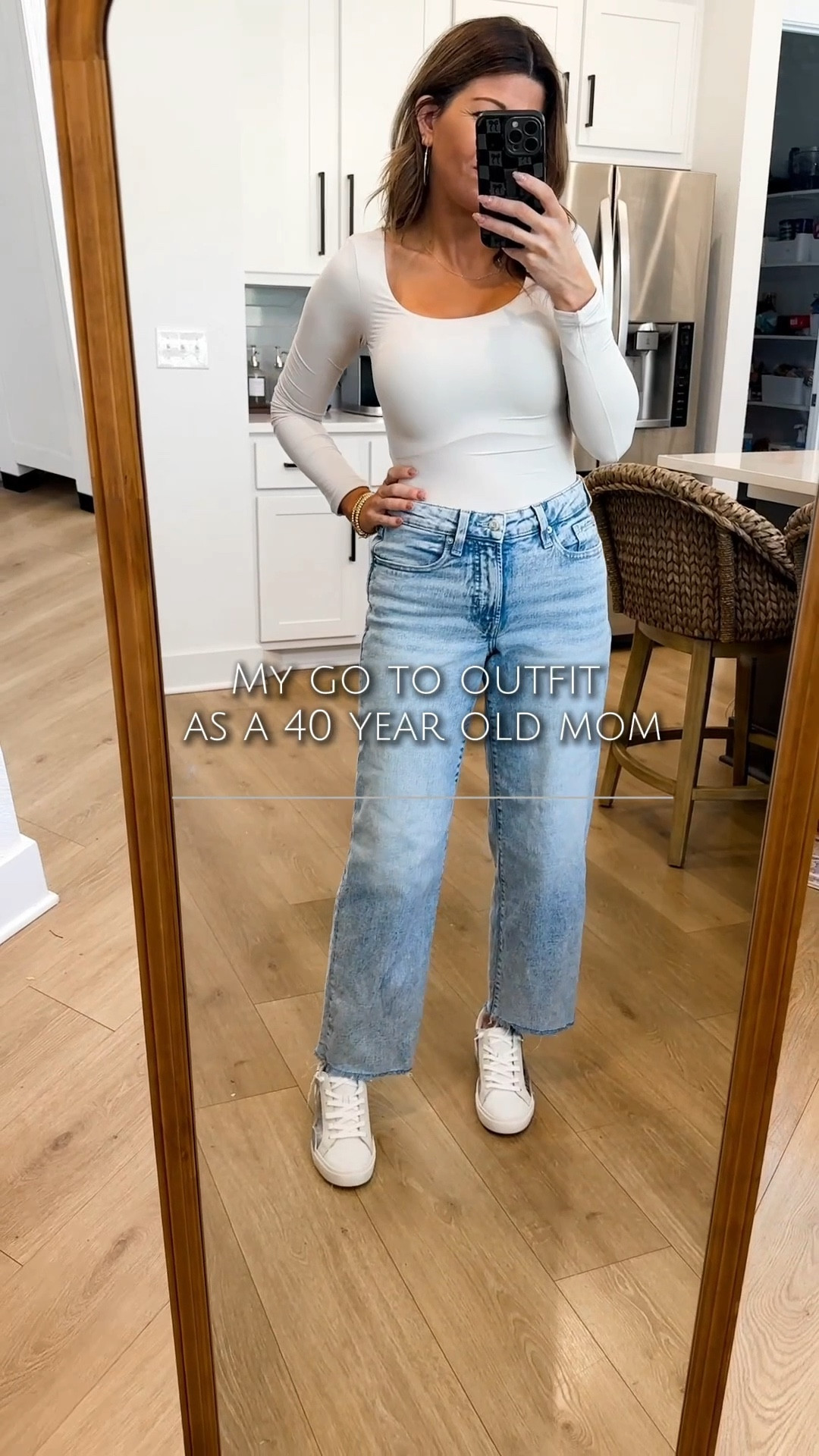 Busy mom. Simple outfit. No overthinking. This is the type of outfit I wear on a weekly basis this time of year. Long sleeve fitted top, jeans and sneakers. Never goes out of style! Wearing a size Small in the top, jeans are a 2, and shoes are 7’s. All fit true to size! 

#LTKmomlife #LTKOver40 #LTKootd