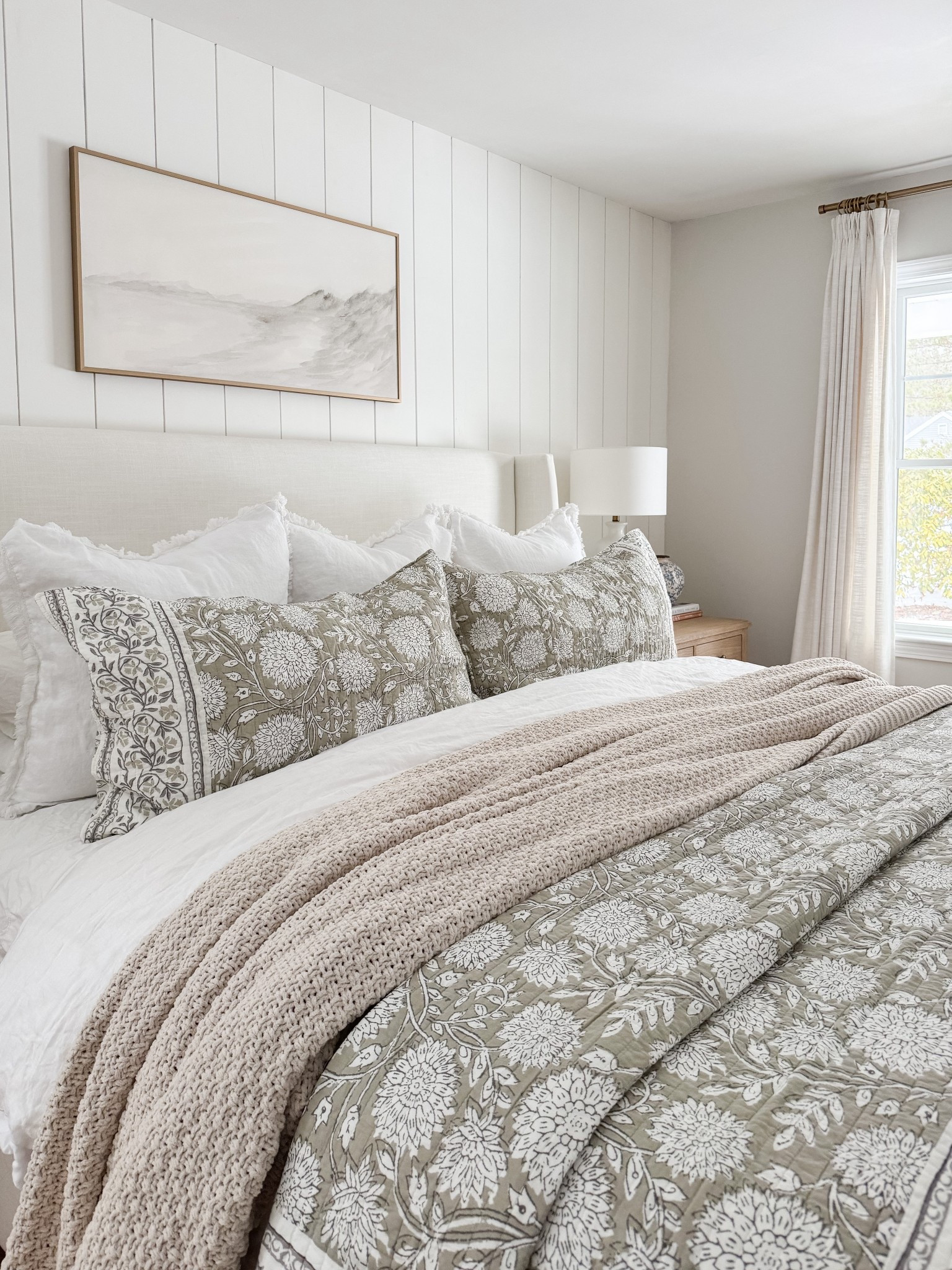 Amazon Neutral coastal bedroom with gingham bedding, layered throw blankets, textured knit coverlet, and soft patterned pillows. Light wood nightstands and white table lamps create a calm, layered spring bedroom look. 
Spring bedding, neutral bedroom decor, layered bedding, spring bedding, coastal bedroom, throw blanket, knit coverlet, patterned pillows, light wood nightstands, white table lamps, cozy bedroom, serene bedroom style, sherri calnan home

#LTKHome