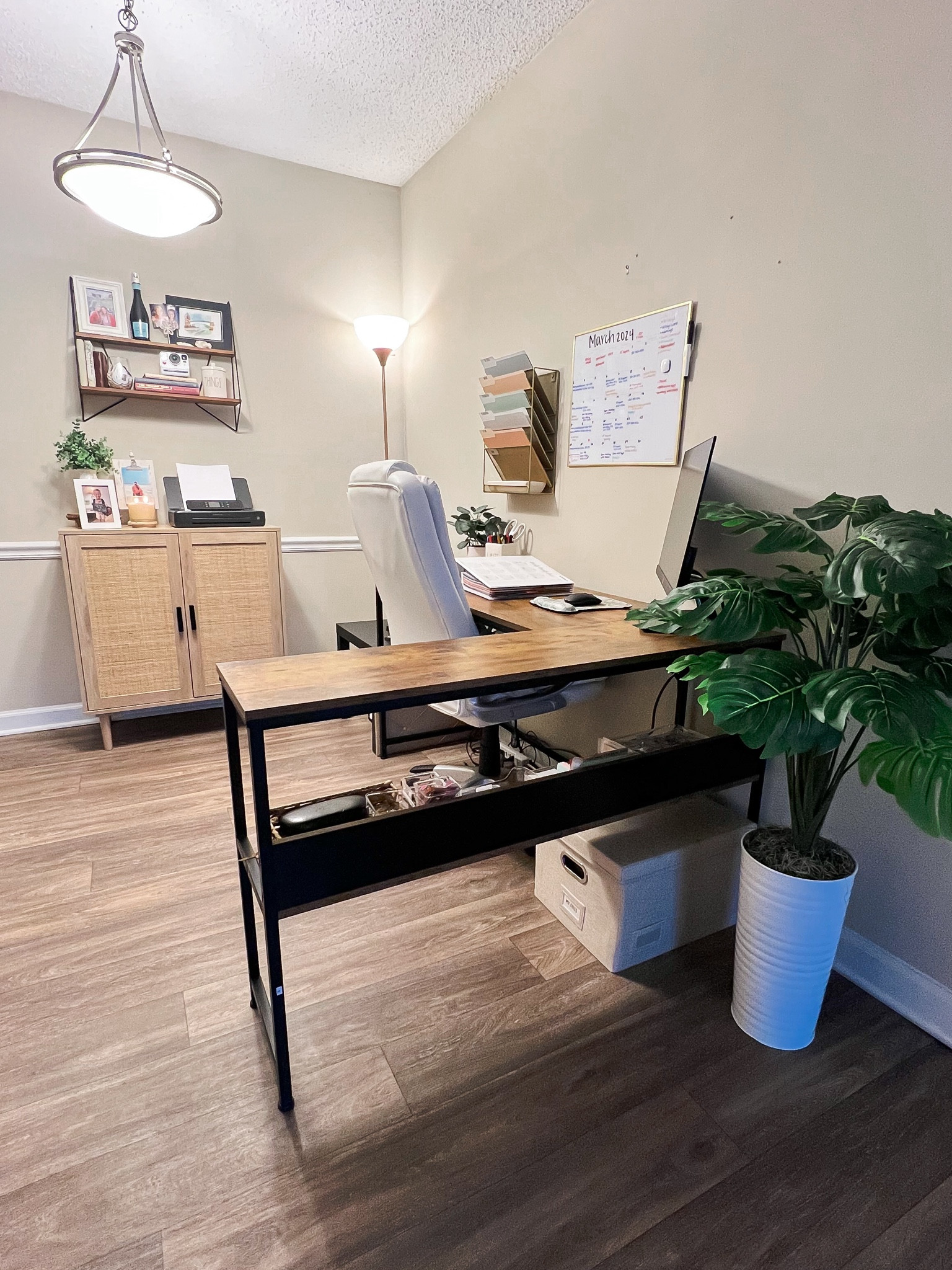 My home office setup 💻✨ 

I love how cute and functional my home office turned out!! I’m OBSESSED with my mobile printer, it’s super compact and quiet. The large cork board and monthly calendar board are must-haves for quick notes. The L-shaped desk, office chair, storage cabinet and cork board are all from Amazon. 

Aesthetic neutral home office, highlighters, file storage, command station, Erin Condren LifePlanner, monthly calendar, label maker, Amazon finds, office supplies, work from home, office desk, storage and organization #founditonamazon #amazonfinds

#LTKU #LTKSeasonal #LTKhome