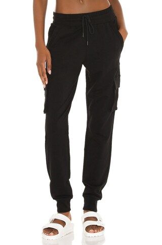 alo Unwind Cargo Sweatpant in Black from Revolve.com | Revolve Clothing (Global)