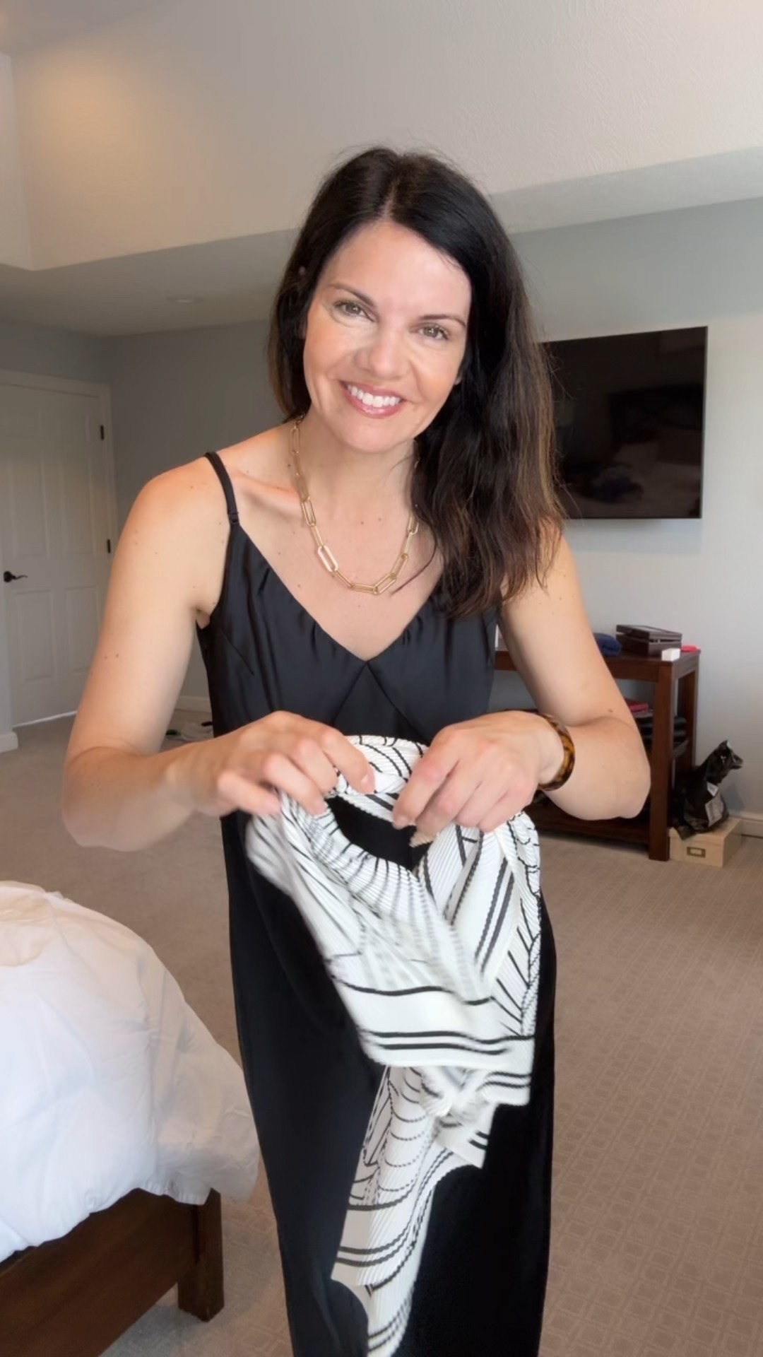 A moment for this slip dress🖤 I added a scarf to change the look ever so slightly. Both the dress and the scarf are easy on your wallet and perfect to have in your closet for a night out or an event. 

#slipdress #scarf #blackdress 

#LTKFindsUnder50 #LTKStyleTip