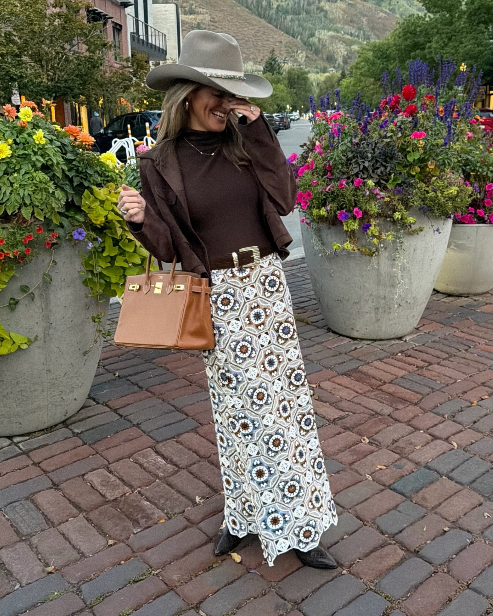 Aspen fall outfit I wore to dinner, Crochet maxi crochet skirt in fall colors! Reformation turtleneck tank and ruti cropped suede jacket. Schutz croc embossed boots.