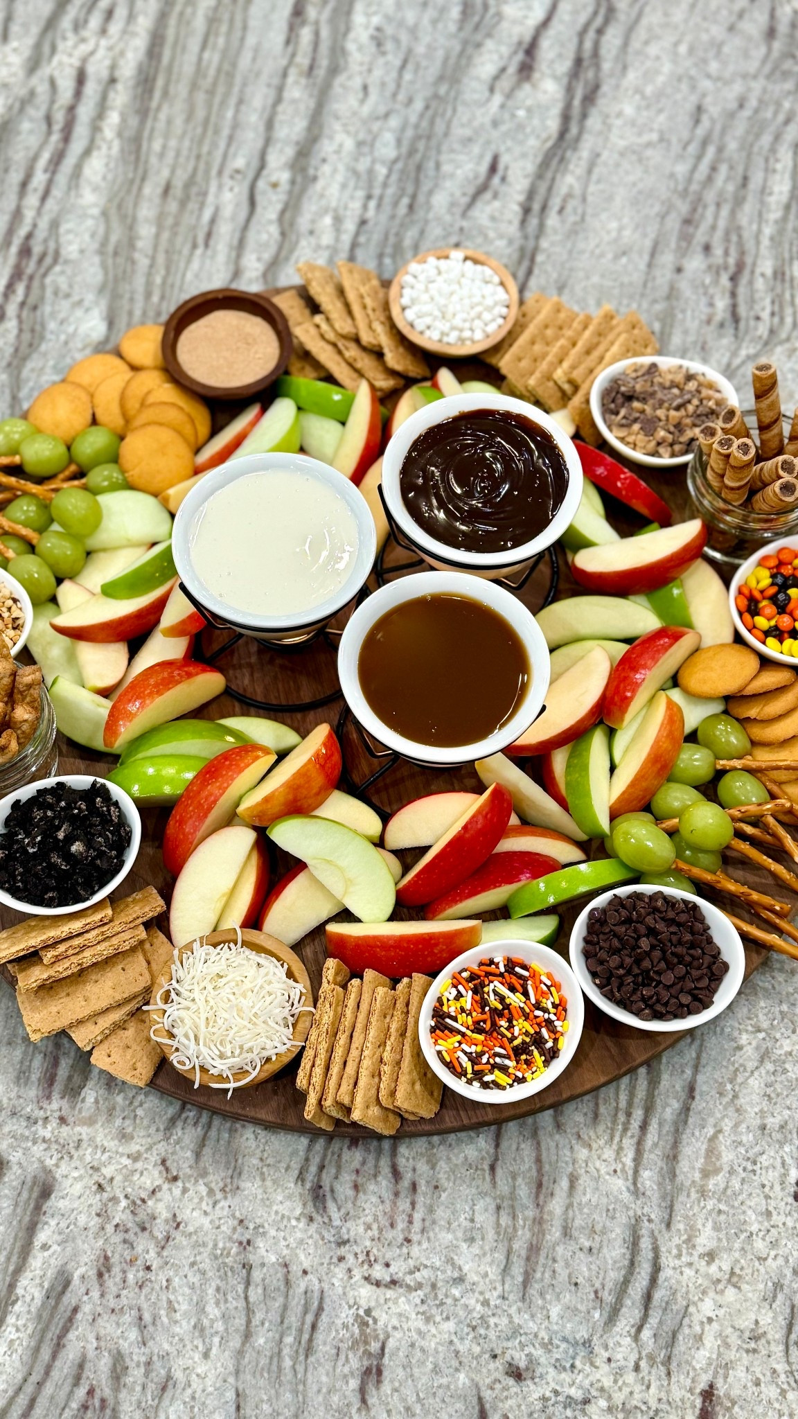 Caramel Apple Dipping Board 🍎🍏🍬 with an array of warm sauces and toppings to dip your apple slices in, this is the coziest board to set out for fall! 😋✨

#LTKParties #LTKSeasonal #LTKHome