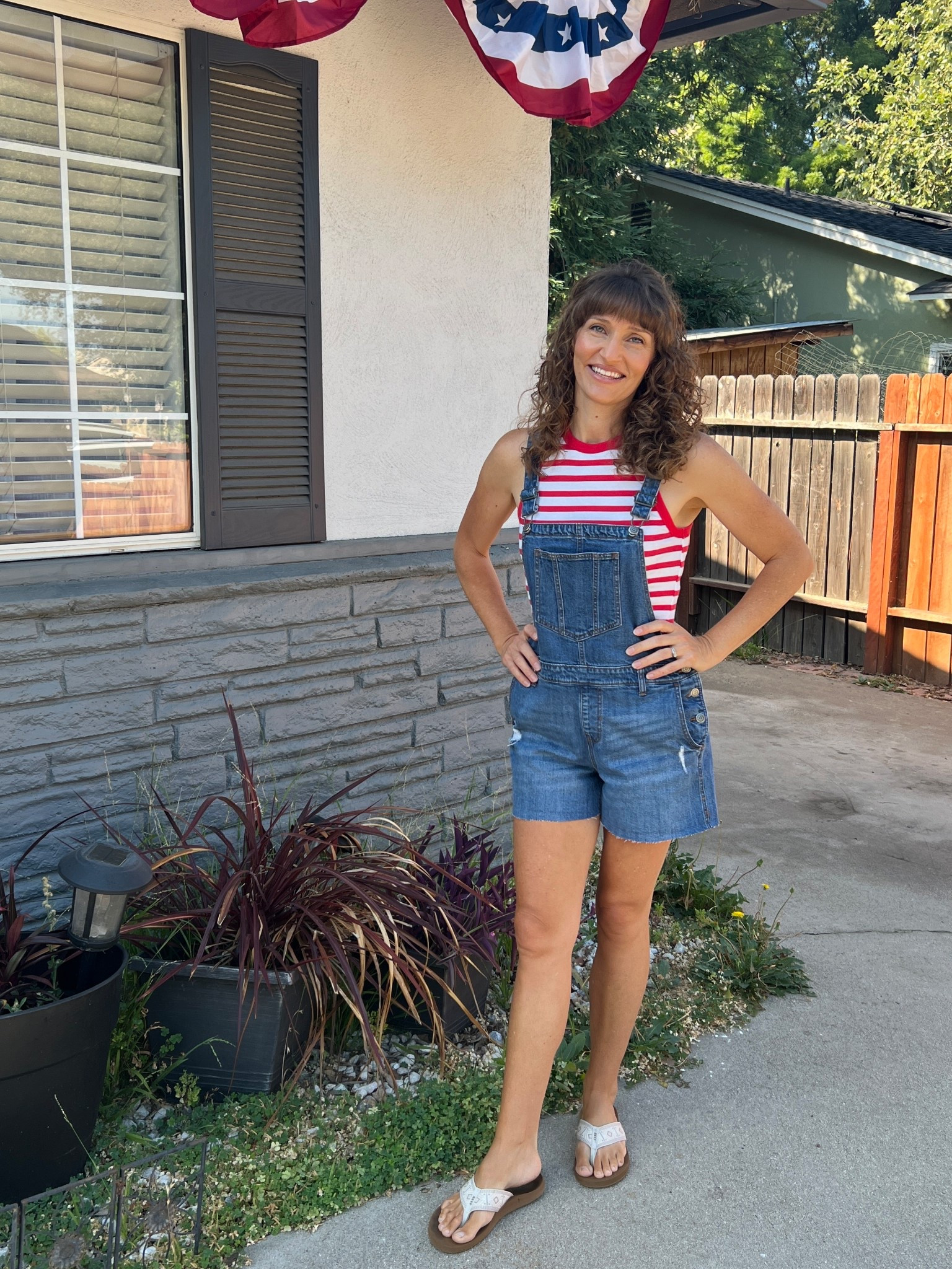 Here is a favorite summer outfit. Striped tank and overalls 😍 of course with flip flops!