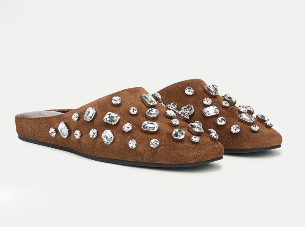 Narcisa Embellished Mule
Tan Suede Crystal Slip-On Shoe

A mule that makes a statement. Crafted from premium tan suede and lined in soft leather, the Narcisa combines slip-on ease with showstopping shine, featuring allover crystal embellishment in varying sizes and shapes. An elevated pair that adds a hint of glamour to the everyday—just slip on and go.

#LTKSeasonal #LTKTravel #LTKWorkwear