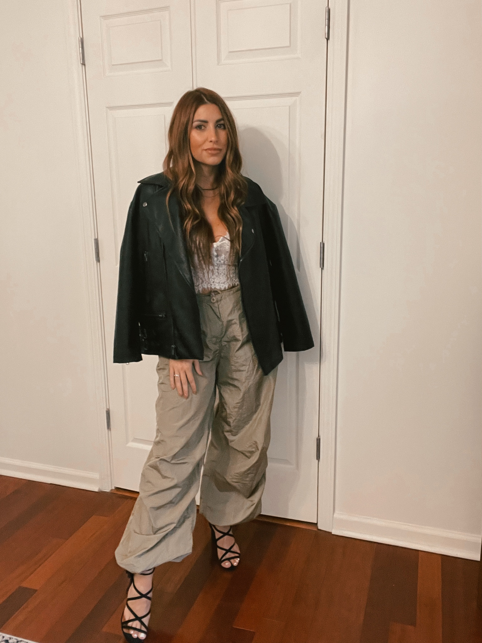 Parachute pants, faux leather jacket, lace  corset  

#LTKSeasonal #LTKstyletip #LTKHoliday