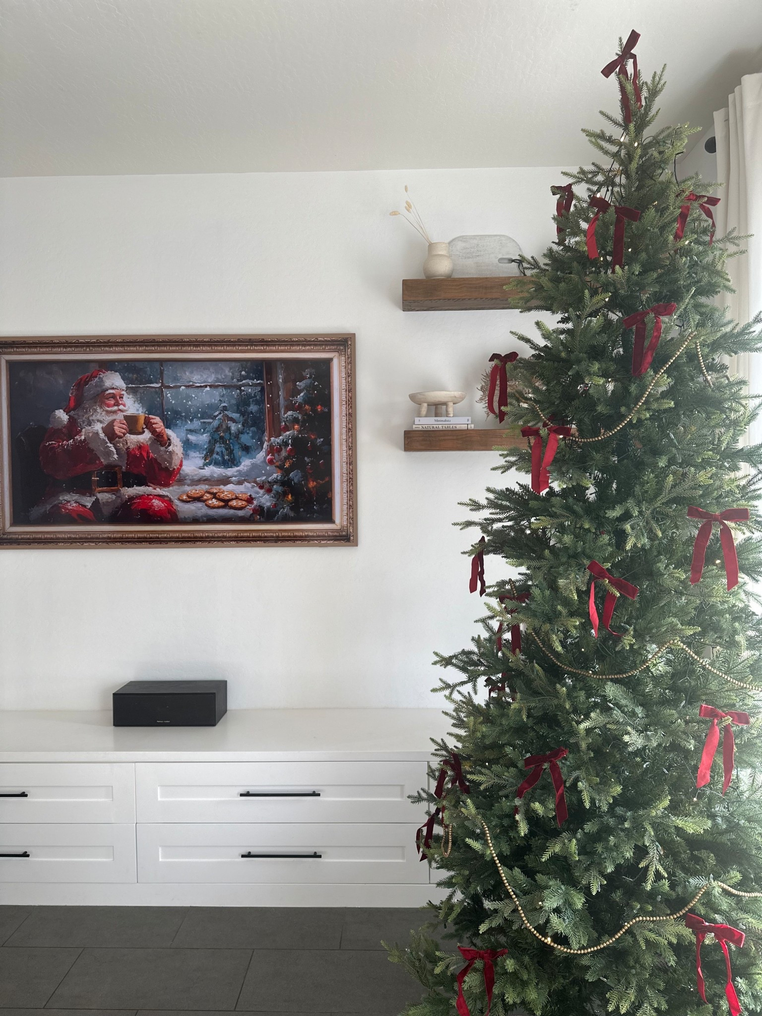 Christmas tree
9 foot slim balsam fir
Its prelit but doesn’t twinkle so I added one string of the little twinkle lights from Amazon 
Burgundy bows 
Classic 

#LTKHoliday #LTKSeasonal