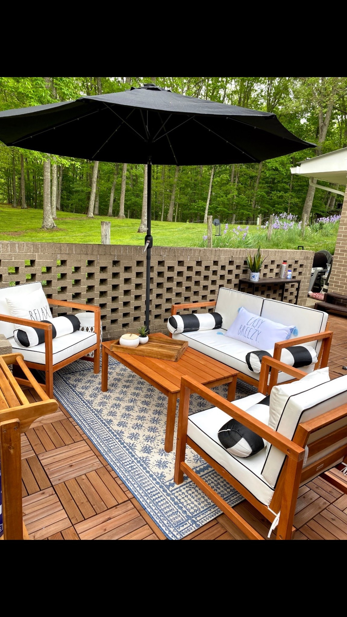 Outdoor furniture / patio furniture / black and white furniture/ summer / patio decor / spring refresh / patio decor / spring decor / patio flooring 

#LTKhome #LTKSeasonal

#LTKSaleAlert #LTKHome #LTKSeasonal