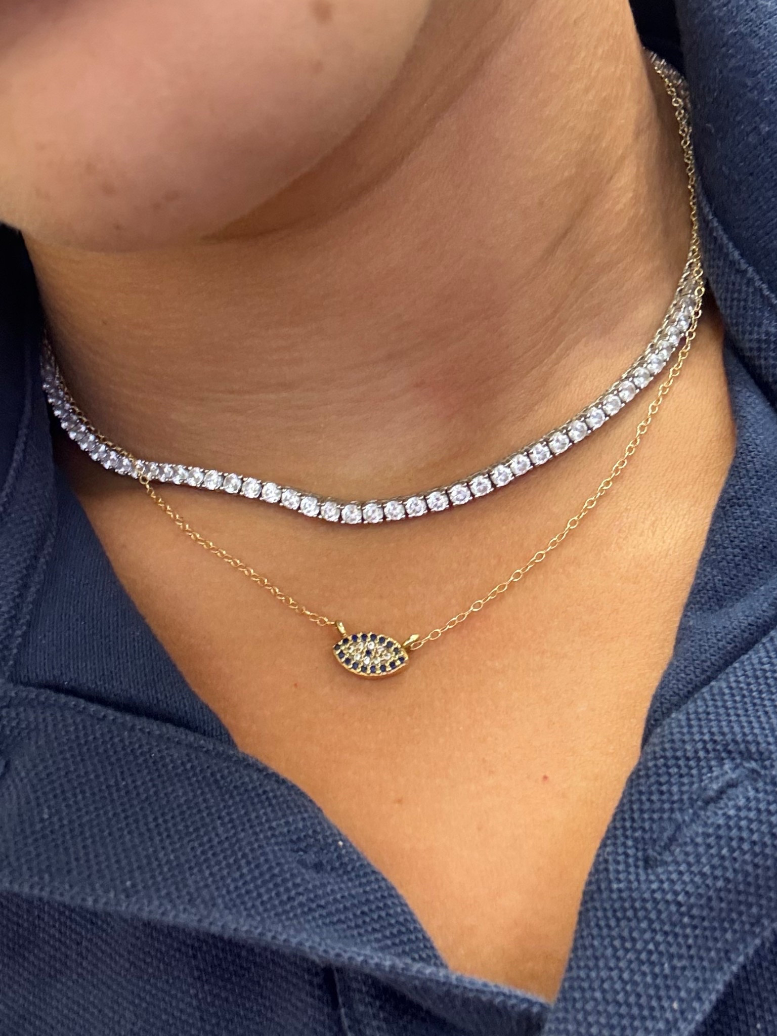 Tennis Necklace 15”

Evil eye necklace 16” 14K Gold Filled