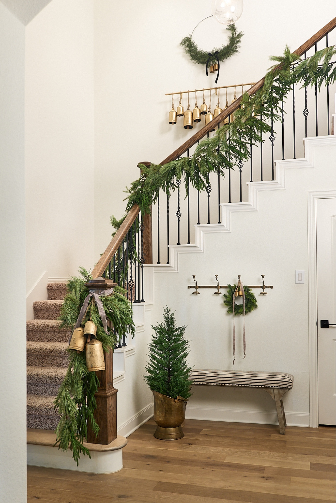 If you have been debating on investing in the Norfolk garland- it is worth it! Here it is layered with the Hearth & Hand garland. The combination of the two give a warm luxurious look! 

I will be adding our tree to this space soon but promised the kids I would wait for them. In the meantime the little Hearth & Hand accent tree is doing the trick!🌲

#LTKSeasonal #LTKhome #LTKHoliday
