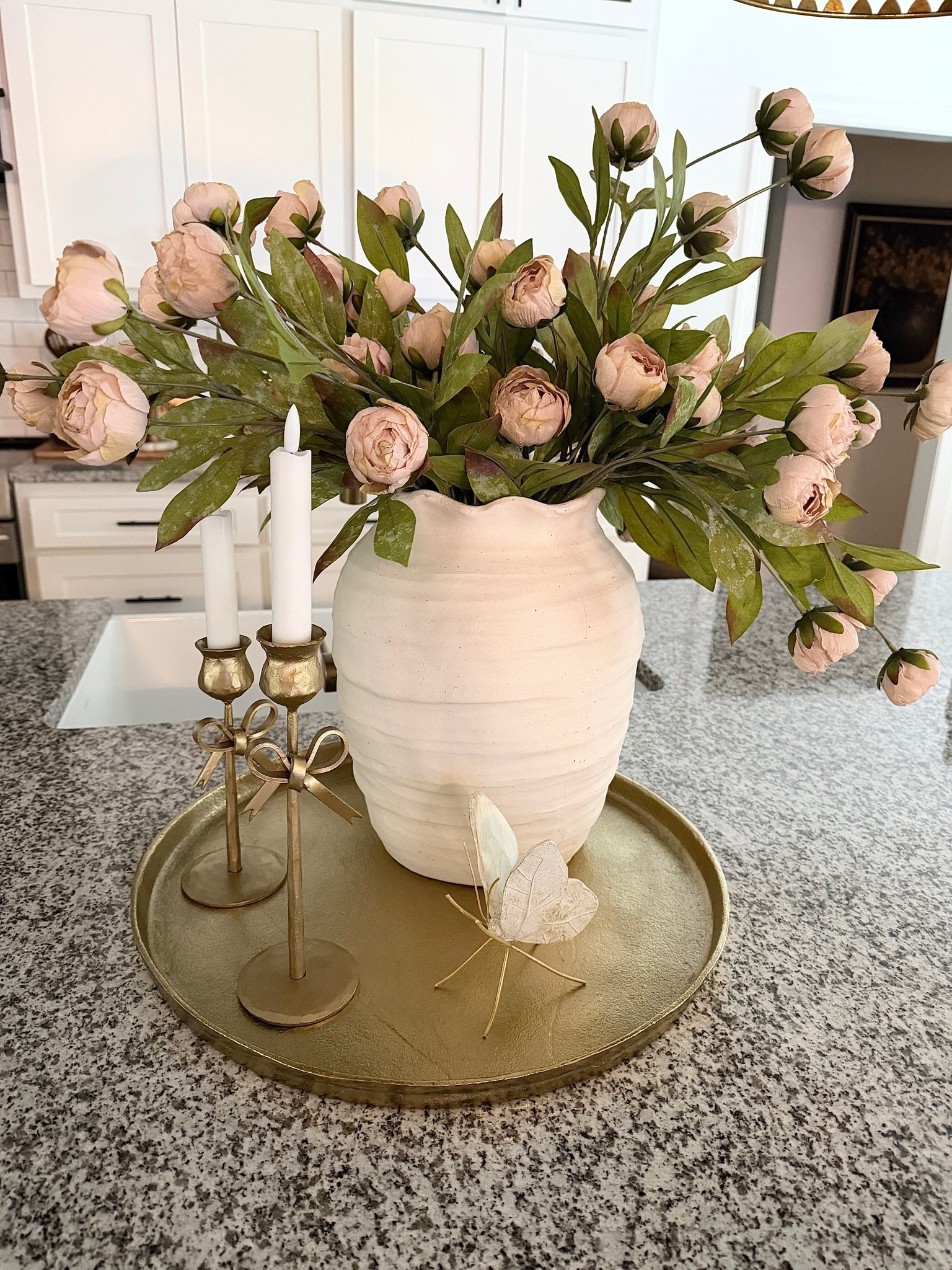 I will never get tired of these stems. They are so pretty! I grounded my arrangement on my favorite gold tray and then added in the prettiest candlesticks with flameless candles and then topped it off with a beautiful butterfly!