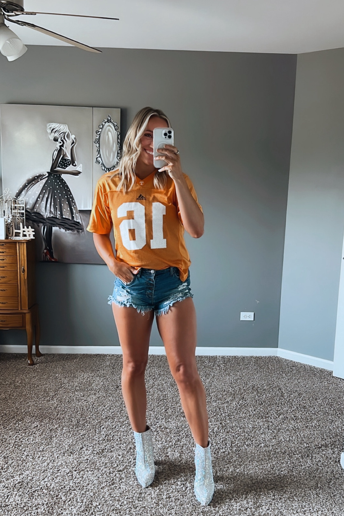 Morgan Wallen concert outfit! Country concert outfit, rhinestone boots, cowboy boots, Betsey Johnson boots, Tennessee vols jersey, Payton manning jersey, football game outfit, Jean shorts, on sale, sale items, boots on sale, festival outfit 

#LTKfindsunder50 #LTKFestival #LTKsalealert