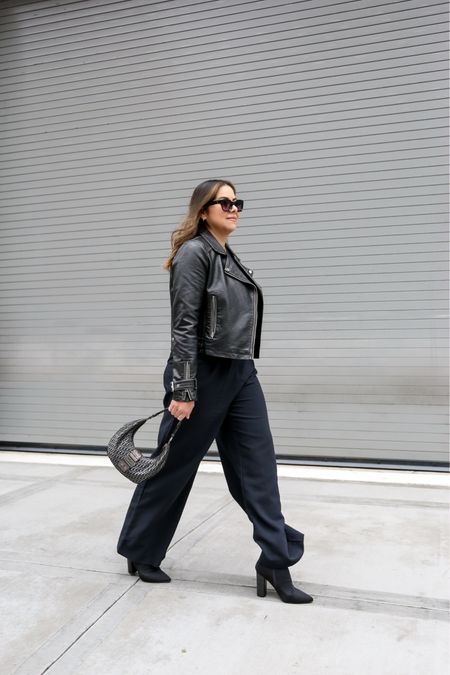 black long trousers, all black chic outfit, date night outfit, black moto jacket outfit

#LTKunder100 #LTKstyletip #LTKSeasonal