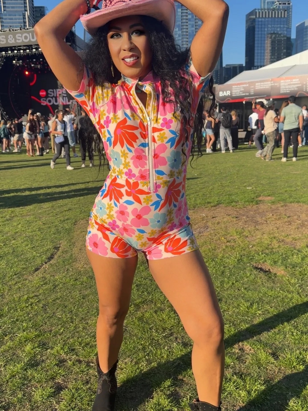 Poolside luxury to full festival mode. FESTIVAL SEASON 🌈in the exact same look. 🌺 SWIMMING SUIT @limericki
.
 The ARTSY FLORAL RASH GUARD ONE-PIECE from @limericki was my MVP. One piece. Zero outfit changes. All the compliments.
.
Here’s why this rash guard is straight fire:

✨ Bold, artistic floral print that feels like you’re wearing a painting 
✨ Sporty front zipper for that cool-girl edge 
✨ Built-in shelf bra + sewn-in pads = actual support (no awkward adjustments mid-set) 
✨ UPF 50+ protection so I stayed sun-safe under those Texas rays 
✨ Sculpting nylon/spandex that moves like a second skin 
✨ Literally made for pool hangs, lounge days, AND stage-ready energy
.
I went from golden-hour dips at the hotel pool to dancing under the lights at the festival without missing a beat. Effortless glow-up.
.
COACHELLA IS AROUND THE CORNER  during festival season just hits different sunshine, beats, creativity, and main-character fashion all in one place.
.
This one outfit captured the entire vibe: artistic, confident, and ready for anything.
.

#LimeRicki #coachella2026

#LTKFestival #LTKTravel #LTKSaleAlert