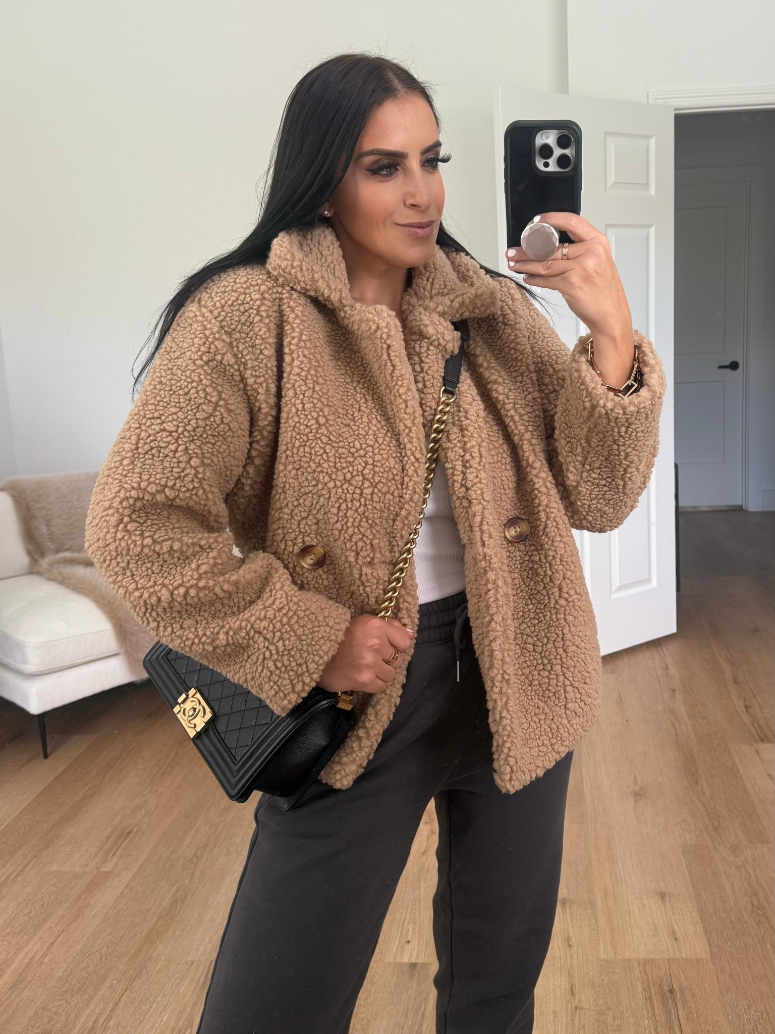 Time and Tru Women's Cozy Teddy Double Breasted Jacket wearing size small. Abercrombie Sunday Sweatpant wearing size small. New Balance Sneakers
