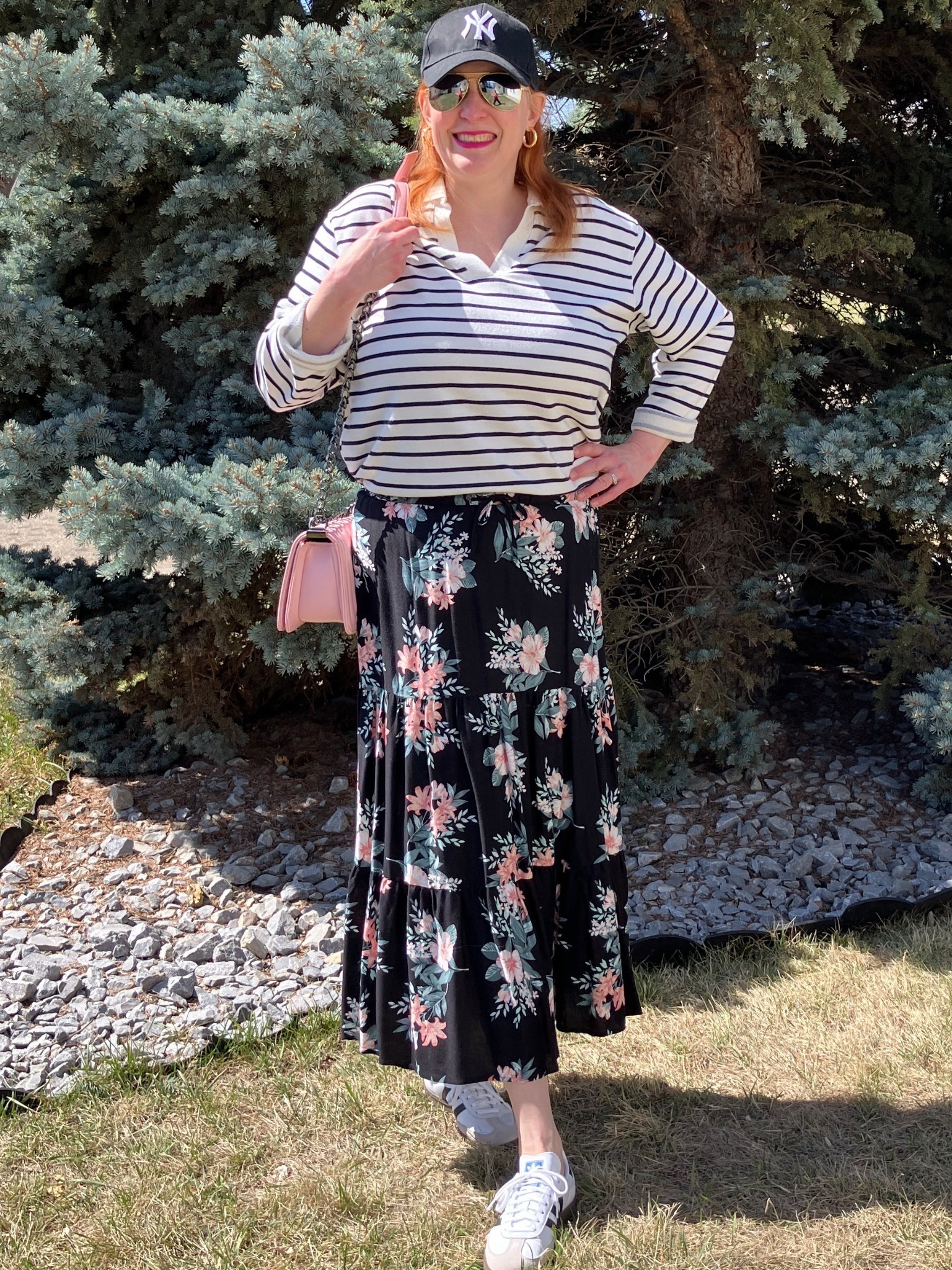 Don’t dream it’s over, dream about a Thursday print mix! To set up this outfit, I chose a striped top with the same color strip as my skirt and sneakers with the same coloured striped as well this makes the look more cohesive. For fun I added a nice pink purse in the shade of the skirt for a pop of colour. Would you try print mixing? Canadians click on the first links to shop, and Americans click on the second links to shop. If there’s only one link then you can shop it in your own country. And remember, trendy doesn’t have to be expensive! Bye!

#LTKmomlife #LTKootd #LTKOver40