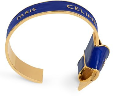 Celine ribbon knotted cuff aus emaille und messing mit gold-finish - CELINE | 24S (APAC/EU)