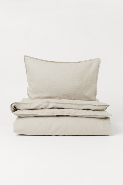 Twin duvet cover set in soft, washed linen for comfortable sleep. Duvet cover fastens at foot end... | H&M (US + CA)