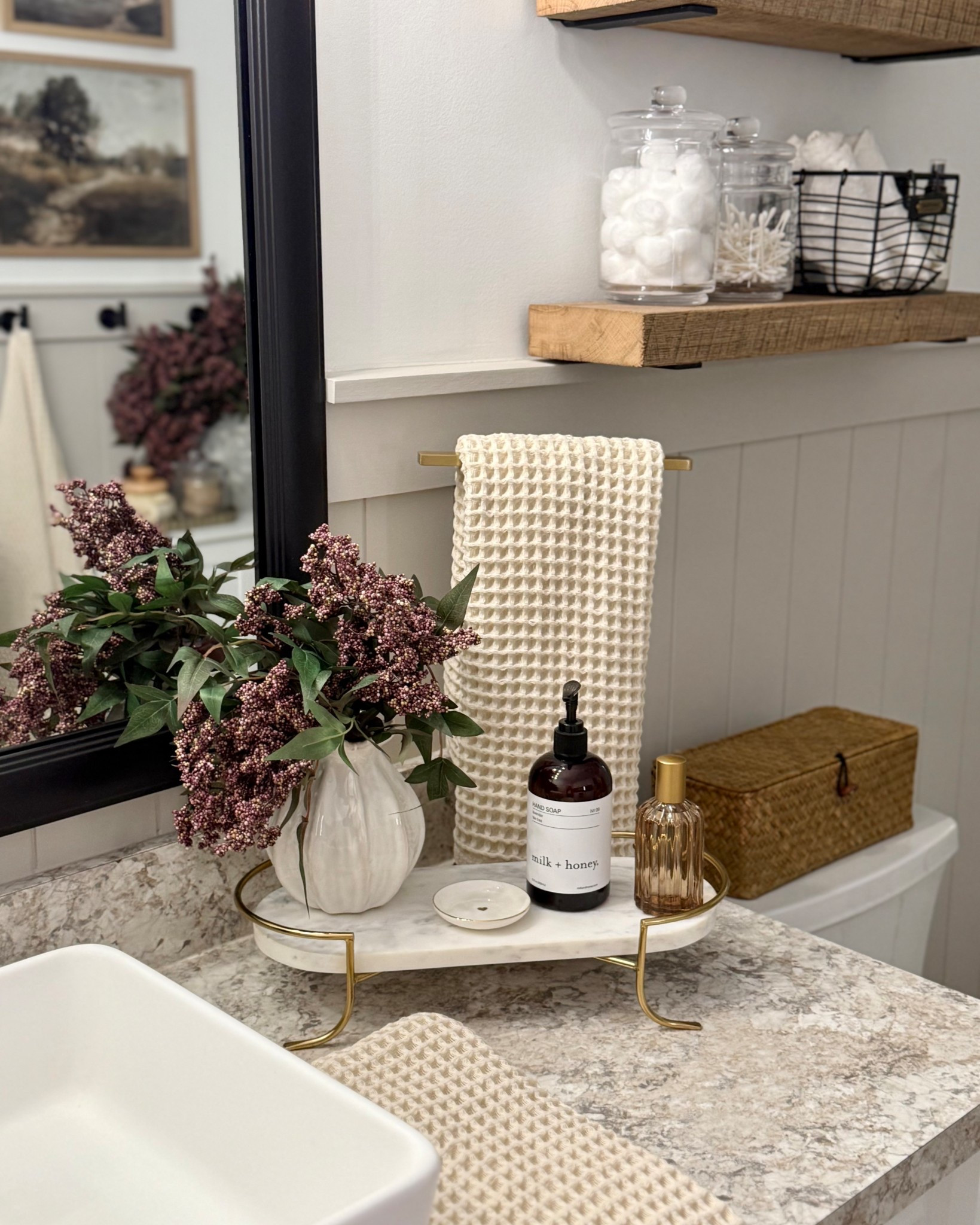 Neutral Bathroom Counter Styling with Marble Tray + Waffle Towel

Follow @farmtotablecreations on Instagram for more simple, elevated home finds 🤍

Clean, layered bathroom styling that feels high-end without overdoing it. A marble tray paired with warm brass accents instantly elevates the space, while the waffle towel adds soft texture. Finished with a simple vase and everyday essentials to keep it functional but still beautiful.

#bathroomdecor #bathroomstyling #countertopdecor #homedecor #neutralhome

#LTKSaleAlert #LTKHome