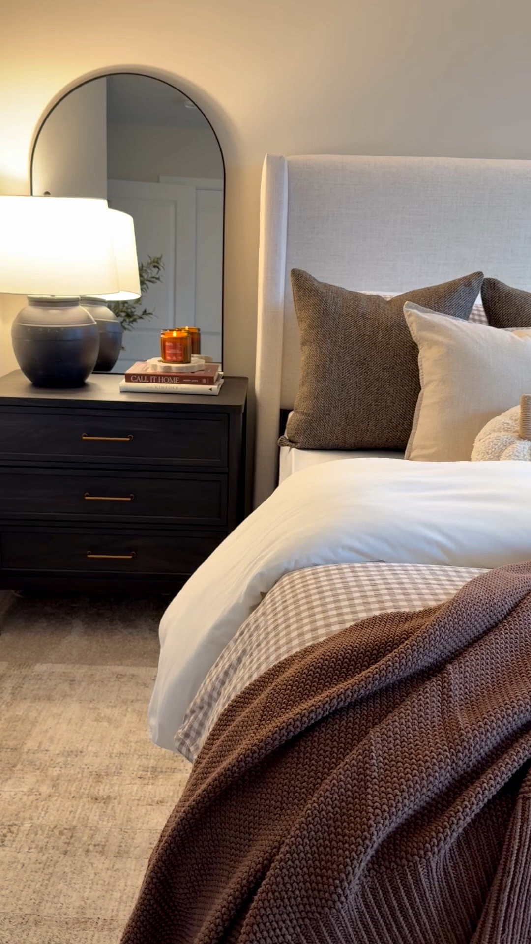Bed styling, gingham, duvet,￼ upholstered bed, black nightstands, black lamps, coffee, table, books, brown knit, blanket, brown, throw blanket, tan pillow covers, brown pillow covers, cream, duvet, plaid rug, pumpkin pillows

#LTKSaleAlert #LTKHome #LTKSeasonal