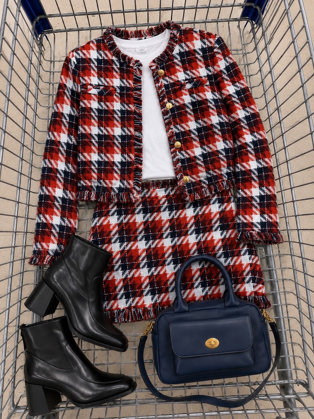 This matching tweed set is such a statement for fall. The crisp white top, black ankle boots and structured navy bag keep it polished without making it feel too dressy. ✨

#LTKNYFW #LTKgrwm #LTKootd