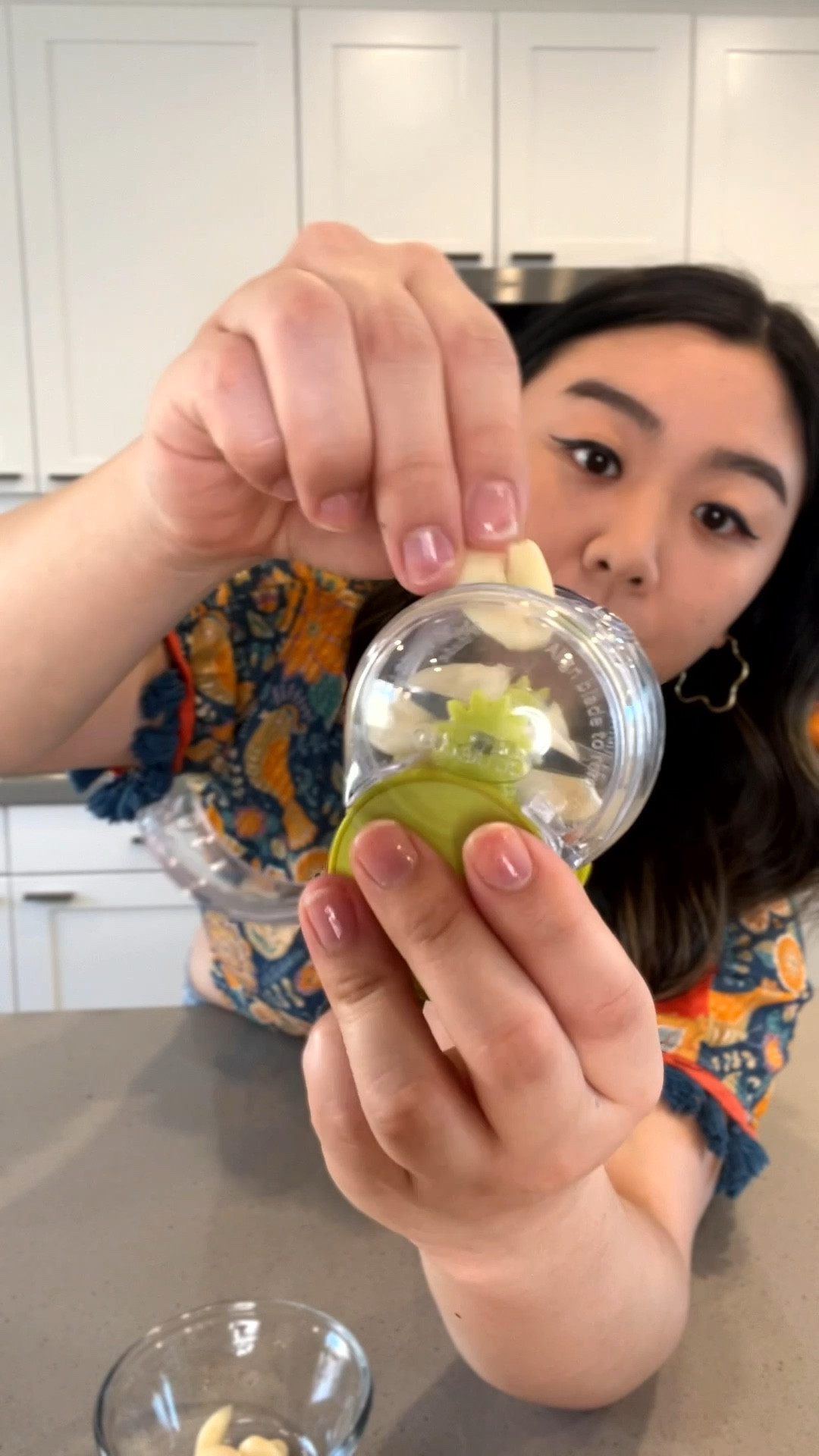 This garlic chopper is on sale! It's also one of those gadgets I don't need but do not regret buying. Never had so much fun chopping garlic before! If Hot Wheels had a garlic-themed car, it'd be this. Watch the full video on my IG @jaminepak 
#kitchengadgets #cookingtools #mealprep #amazonfinds #BigSpringSale

#LTKfindsunder50 #LTKhome #LTKVideo