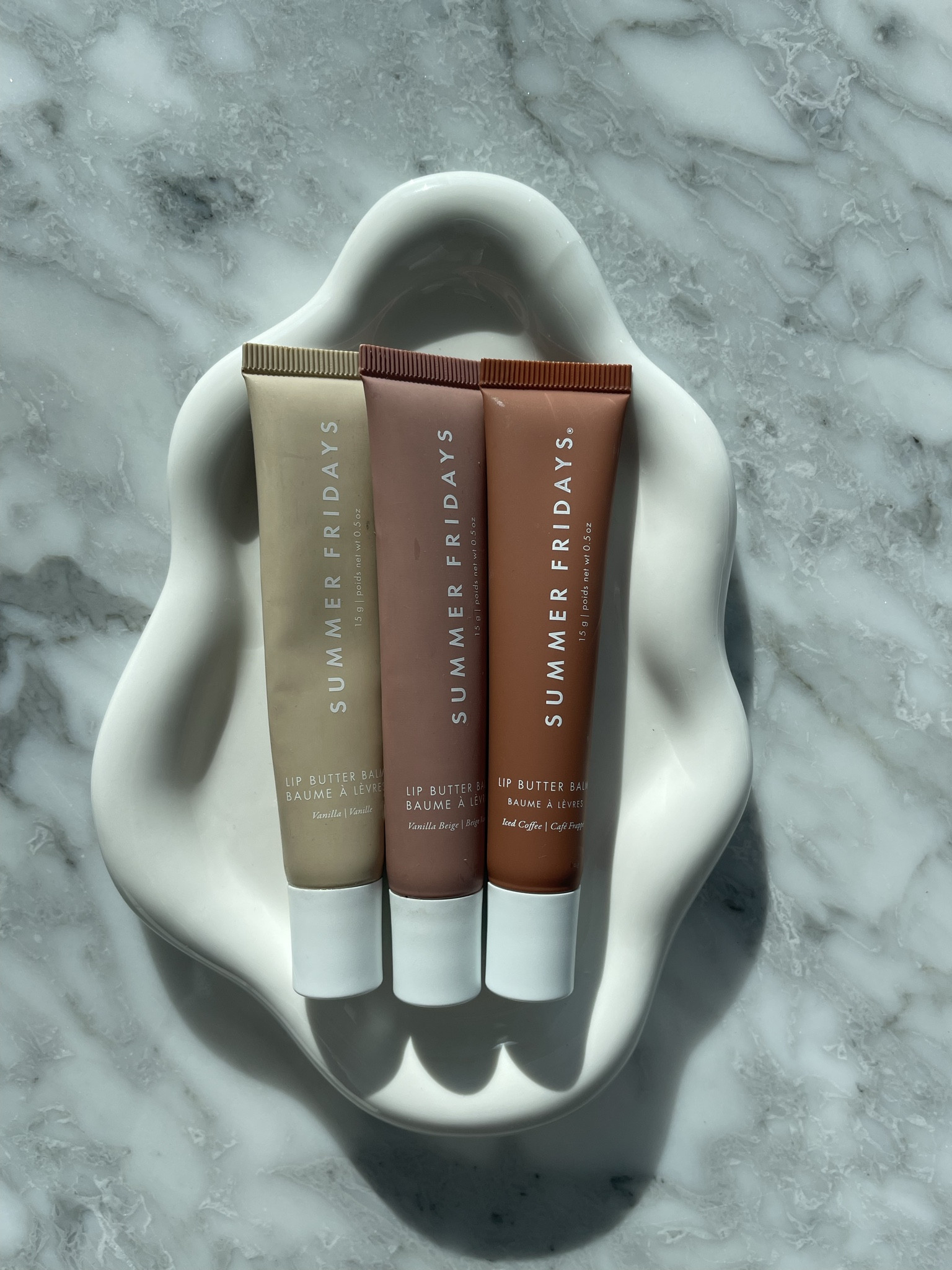 The Summer Fridays Lip Butter Balm is that everyday essential you don’t realize you need until you have it — ultra-buttery, cushiony, and instantly softening. It melts onto the lips with that signature glossy-sheen finish: not sticky, not heavy, just the perfect layer of hydration that makes your lips look fuller, smoother, and naturally glowy. The texture is rich but breathable, giving “your lips, but softer” energy whether you’re bare-faced or wearing a full makeup look.

What makes it so good is the way it wears — the balm stays plush for hours, calming dryness while giving a healthy, juicy shine that photographs beautifully. It layers seamlessly with lip liner, makes a perfect prep step under lipstick, and feels luxurious enough to use as an overnight lip mask. Clean ingredients, subtle scents, aesthetic packaging… it’s the kind of product you keep in your bag, on your vanity, and in your car because one is never enough.

If you’re looking for a hydrating, buttery, everyday lip product that actually feels as good as it looks, the Summer Fridays Lip Butter Balm is that girl.

Hashtags
#SummerFridays #LipButterBalm #CleanBeauty #HydratingLipBalm #JuicyLipLook #SoftLips #GlowyMakeup #NoMakeupMakeup #BeautyEssentials #ViralBeauty #AestheticSkincare #LTKBeauty #MakeupBagStaple

#LTKGiftGuide #LTKHoliday #LTKBeauty