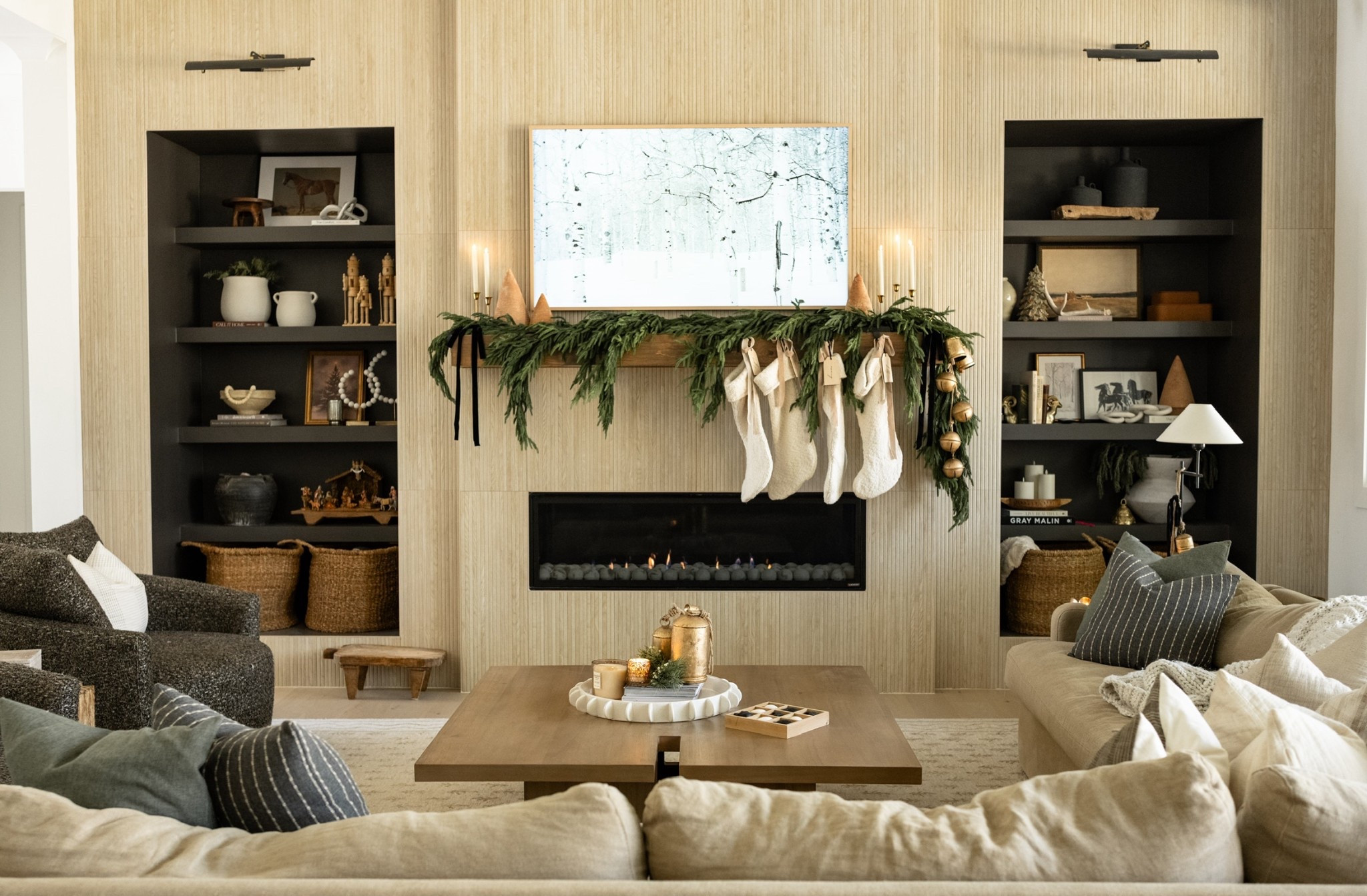 The coziest view this season 🤍✨ Layers of greenery, soft neutrals, and warm textures make this space feel so peaceful and inviting. I kept our mantel simple yet timeless with fresh cedar garland, brass bells, and knit stockings for that soft organic Christmas look I love.

Shop my garland, stockings, coffee table tray styling, and favorite holiday home accents below!
#porcheandco #holidayhome #modernclassicstyle #neutralchristmasdecor #coffeetablestyling #manteldecor #homedecorfinds

Need even more styling or interior design help inside your home?! Visit our Online Interior Design Studio and one of our designers would love to help! Secure your packages today 🏡 —> https://porcheandco.com/edesign

#LTKHome #LTKHoliday #LTKSeasonal