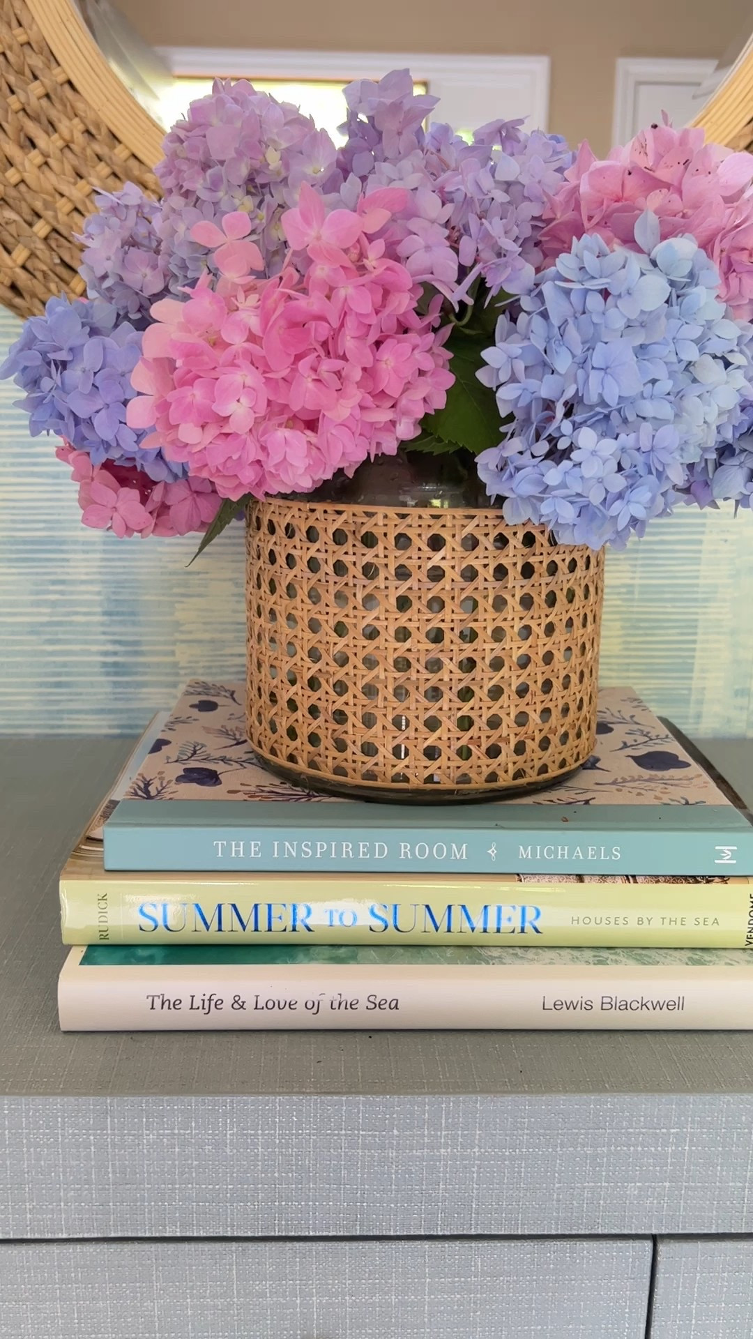This cane-wrapped vase is perfect for spring and summer flowers and adds natural texture to any shelf styling moment. I love how it brings coastal warmth and effortless designer-inspired style to bookshelves, consoles, and tables. 



#LTKOver40 #LTKHome #LTKvlog