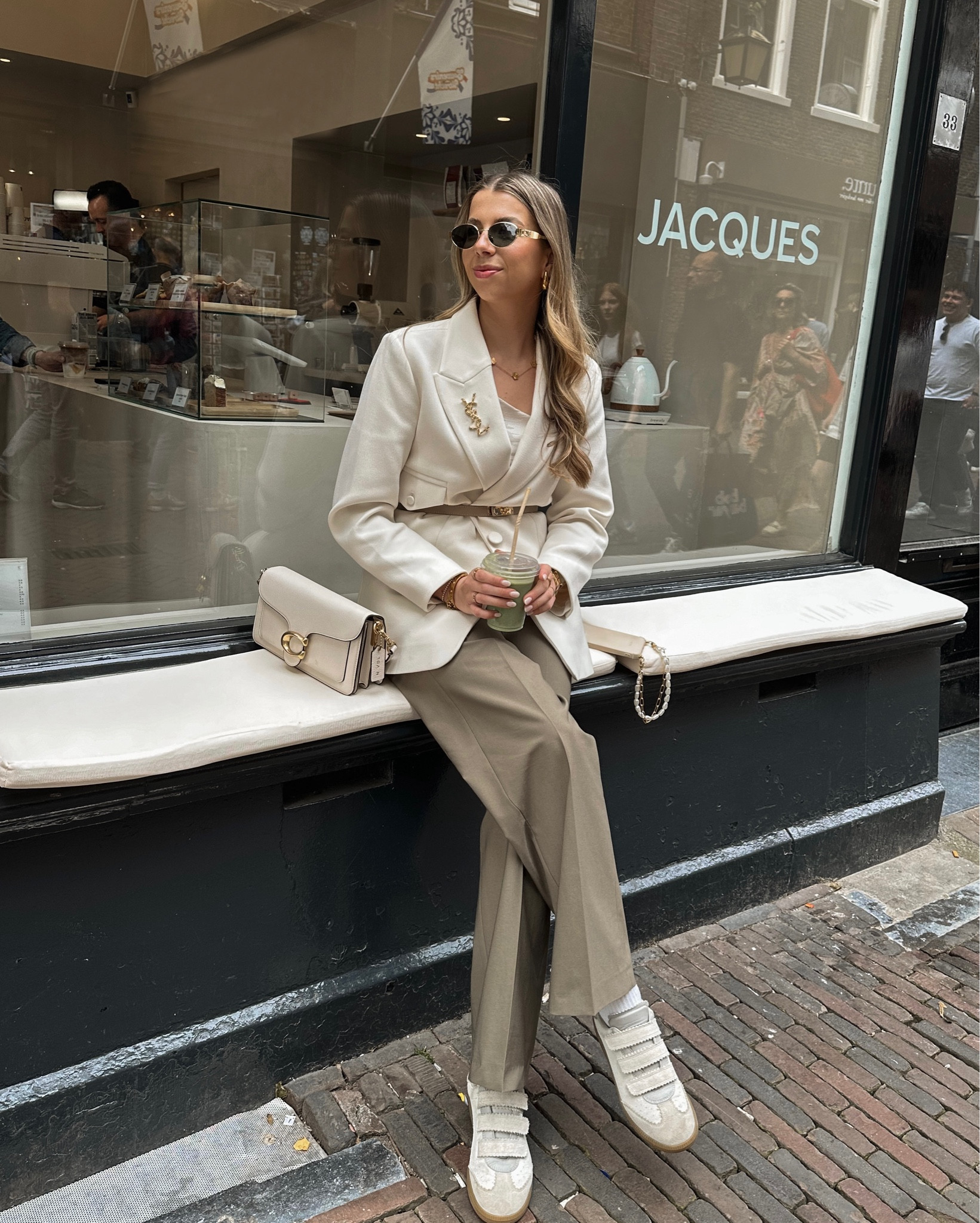 Lovely day ☕️🤍
•
•
Monochrome style, chic style, Josh V blazer, cream blazer, white blazer, khaki trousers, Zara trousers, Isabel Marant shoes, flat sneakers, Adidas Samba, taupe belt, Kelly belt, Coach bag, Tabby 26, white bag, Celine sunglasses, Triomphe sunglasses, coffee date

#LTKstyletip #LTKnederlands #LTKspring
