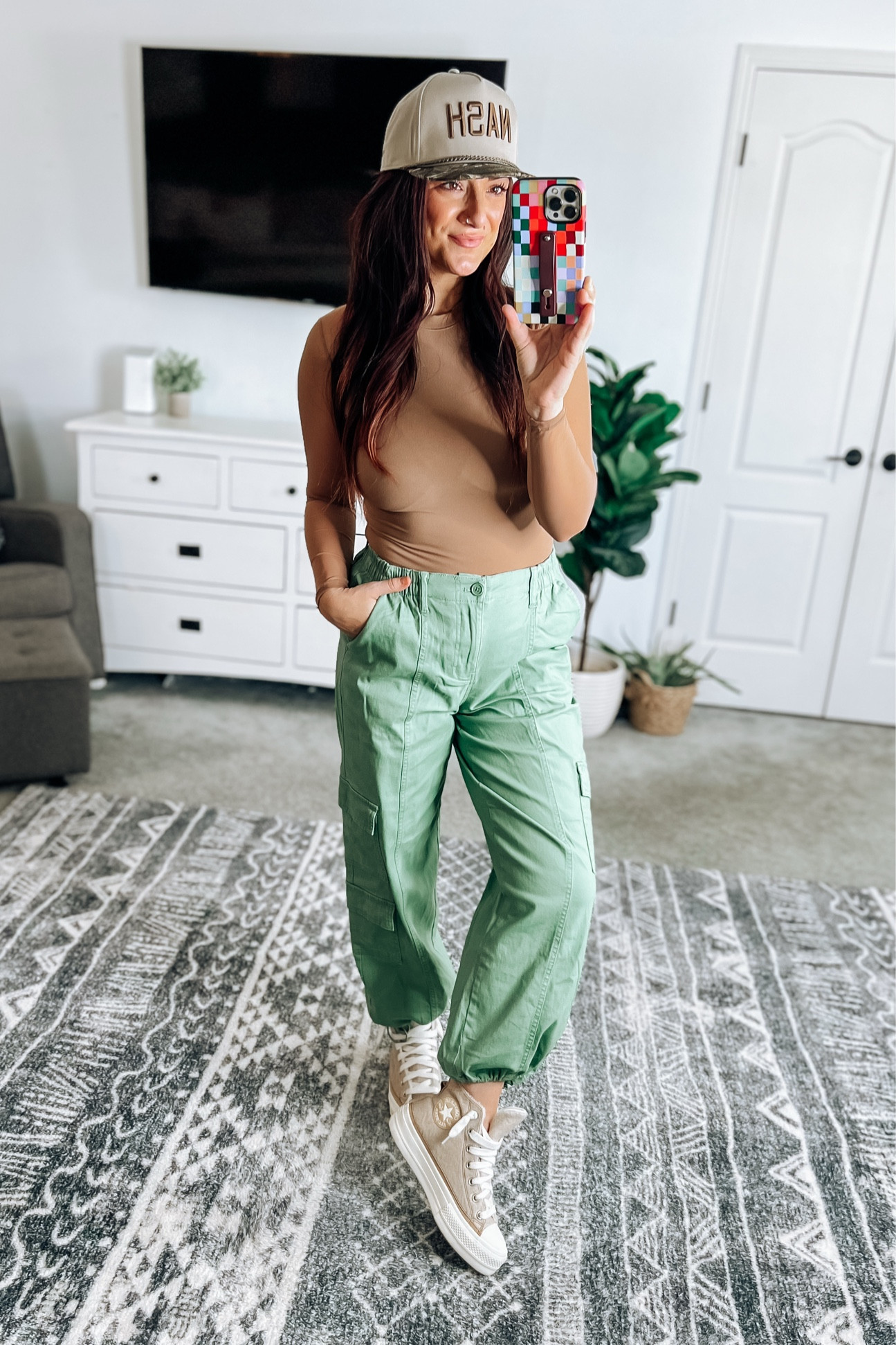 Love these new parachute cargo pants from Walmart! Under $19 and comfy/cute! True to size, but you could size down if between because they have an elastic waist 👌 they have a bungee that I tied for the look, but you could leave them out for more of a wide leg. These will be great pants for going into spring! 

#LTKStyleTip #LTKFindsUnder50 #LTKSeasonal