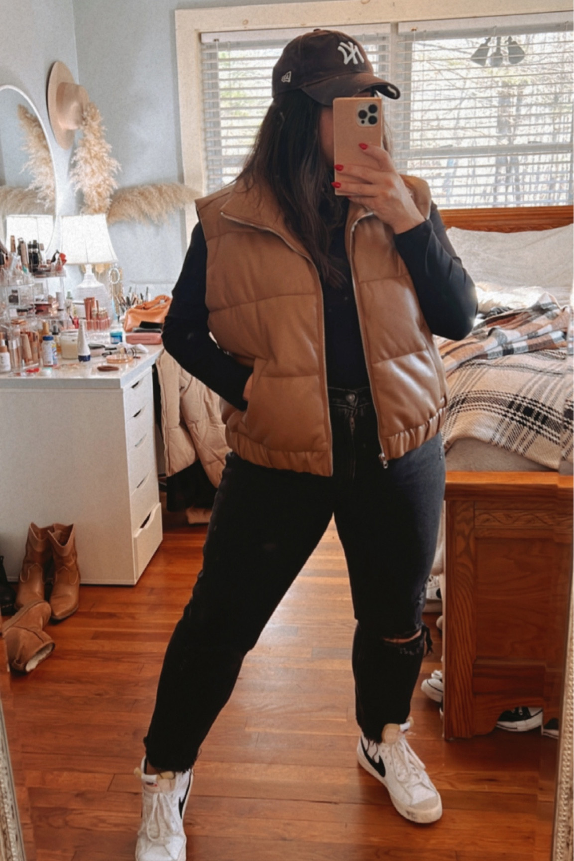 Camel puffer vest
Black jeans
Black denim
Black bodysuit
Nike blazer high top 

#LTKworkwear #LTKfit #LTKcurves