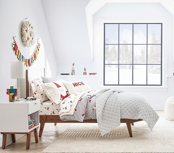 west elm x pbk Modern Smiley Santa Organic Sheet Set & Pillowcases | Pottery Barn Kids