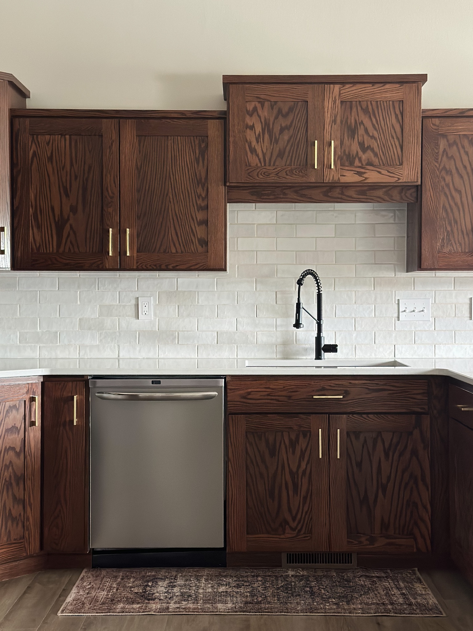 Our kitchen runner is on sale today! 7'6" x 9'6" for only $125!

Amber Lewis Loloi rug, teal/antique, matte black kraus kitchen faucet, white quartz countertop, Alexander James tile, handcraft white ceramic tile, brass cabinet hardware, walnut kitchen cabinets, affordable tile 

#LTKhome #LTKstyletip #LTKFind