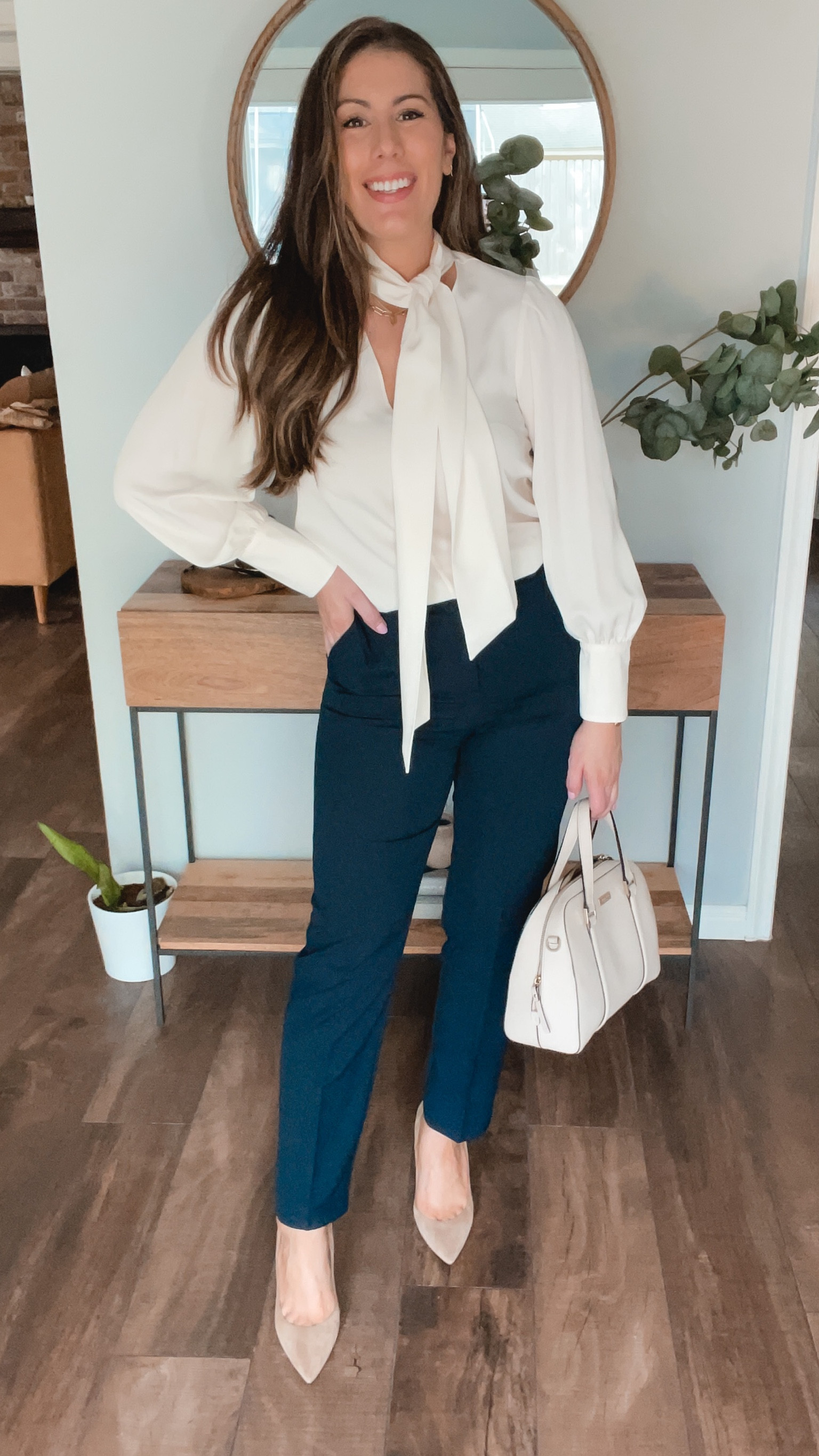 Loving this too from Mango. Such a pretty blouse for work wear . Wearing size small. 

The navy trousers hit just above the ankle. Wearing size 6 here.  Comes with black belt.  

#LTKworkwear #LTKFind #LTKunder50