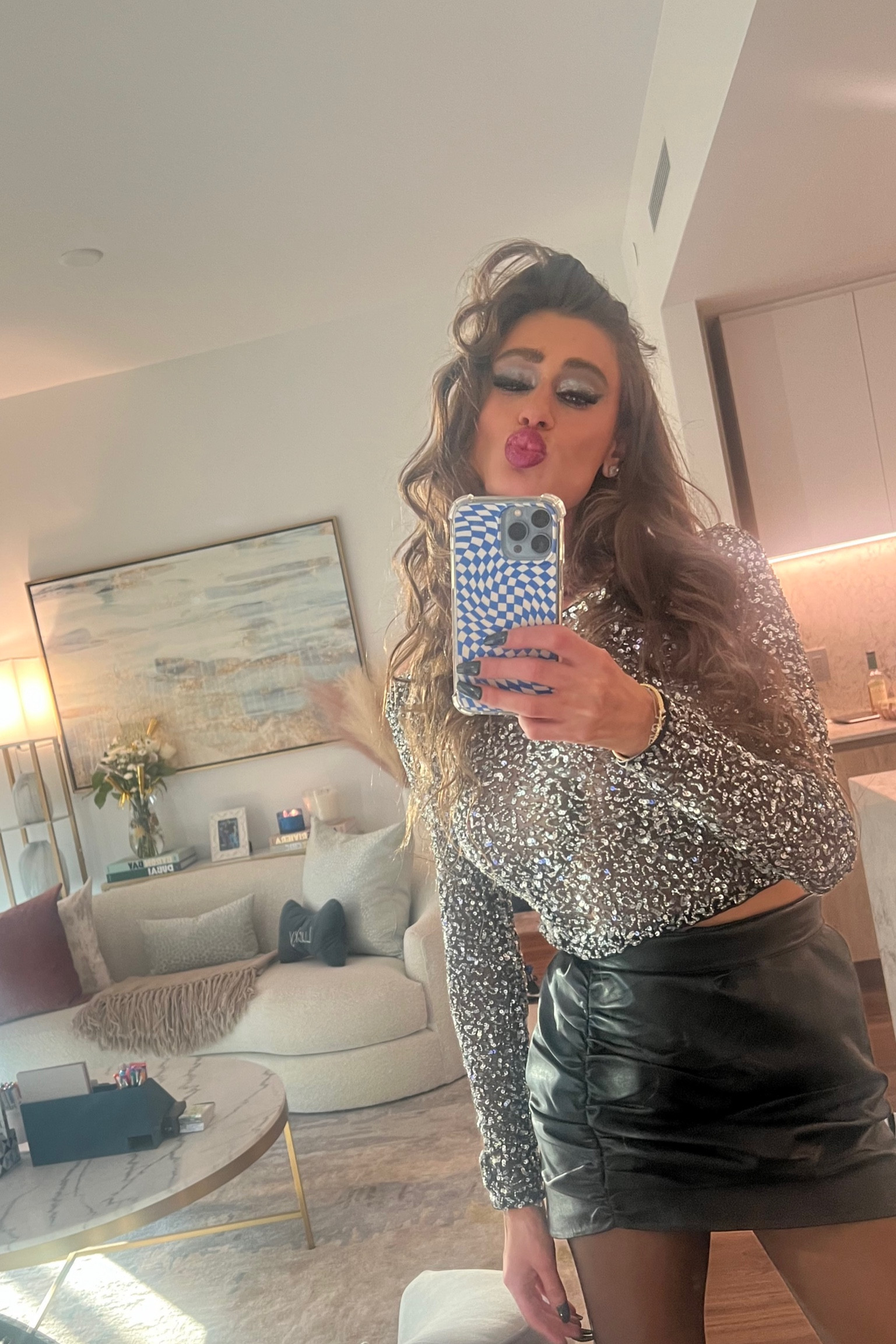 Love me a sequin and leather moment. Chilly evenings call for a mini leather skirt, sheer tights and of course a sexy sequin top 🖤🩶

Shop the look and I’ll also include the shoes and handbag I wore 😍

#LTKU #LTKshoecrush #LTKstyletip