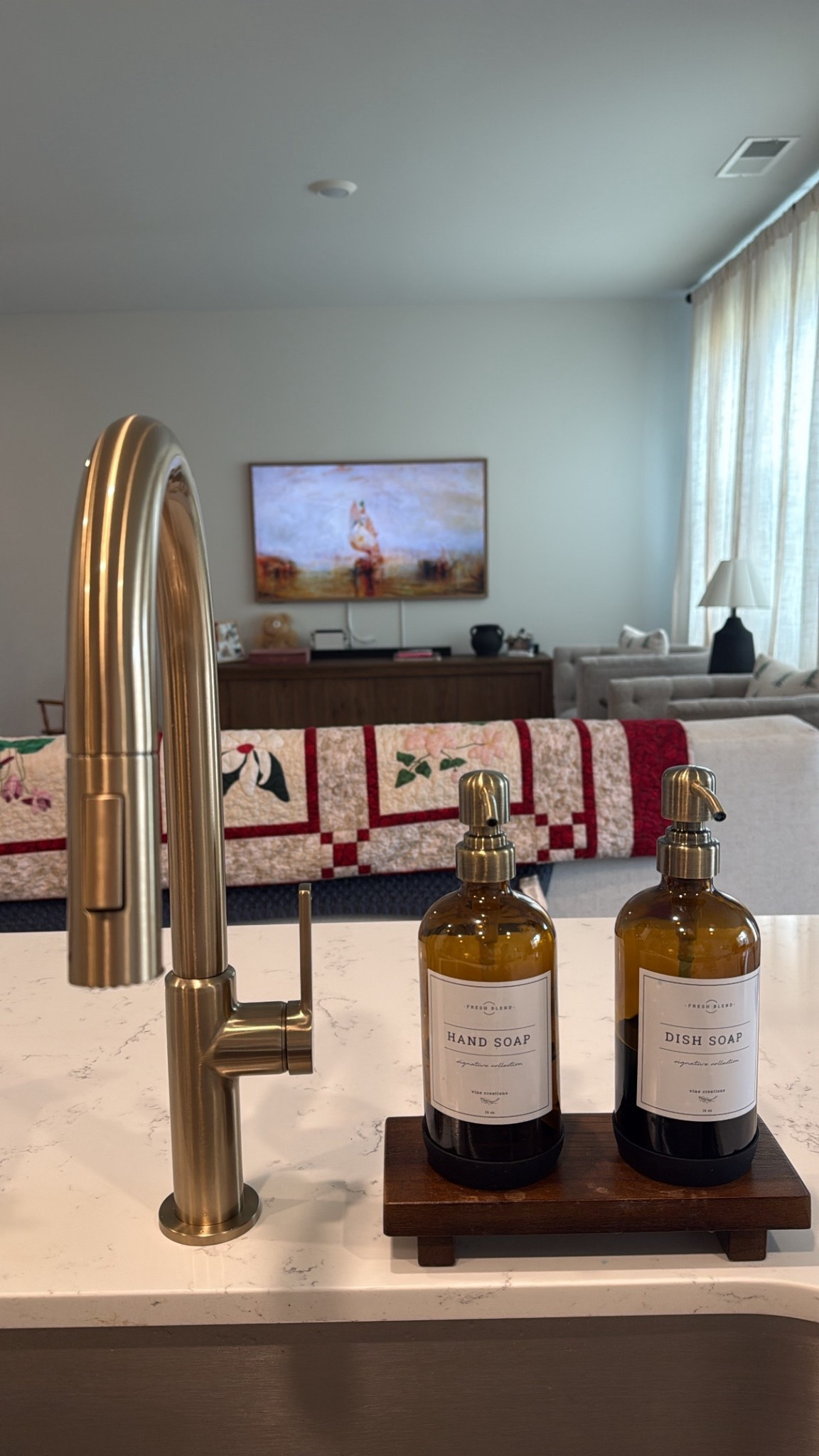 Gorgeous brass kitchen faucet and soap dispensers. I love these new additions to my kitchen! 

#LTKHome