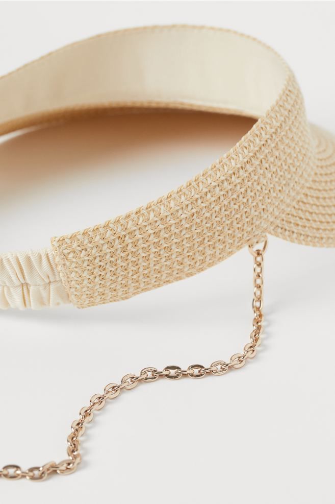 Sun visor in braided plastic straw with attached metal chain attached at sides. Covered elastic a... | H&M (US)
