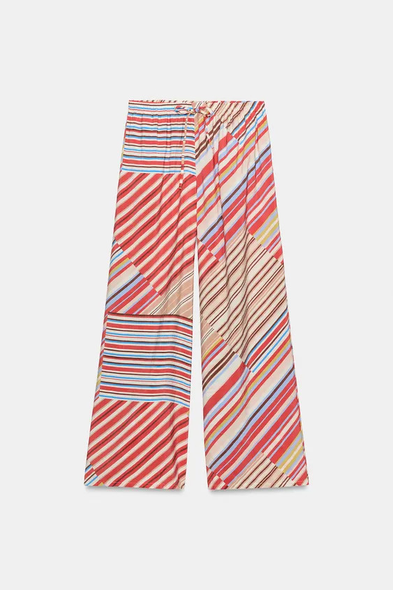 Model height: 177 cmHigh-waist trousers with an adjustable elastic drawstring waistband. Front po... | Zara UK