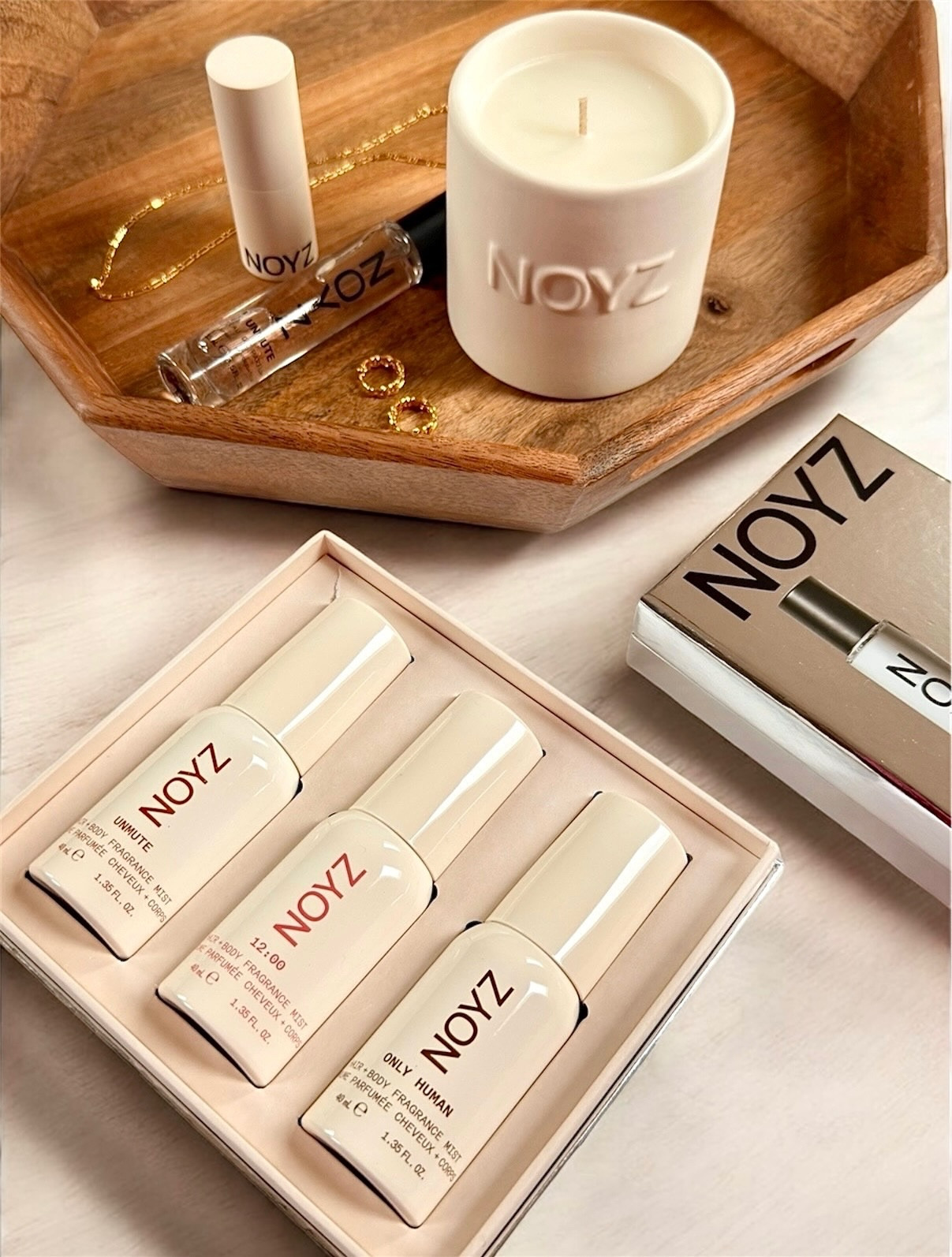 @noyz_official put out a few limited-edition sets for the season, and they’re perfect for holiday gifting - simple, sleek and full of their best scents. ✨

First up: the Unmute Travel Set. 
This set gives you both the solid and the travel spray of their viral vanilla scent, so you can wear Unmute however you’re feeling. Wear them on their own or layered together or even with another one of your NOYZ favorites. 

Then there’s the Mini Hair + Body Fragrance Mist Trio.
Three best-sellers in one travel-ready set - Unmute, 12:00 and Only Human (my personal favorite). They’re light, layerable and perfect for tossing in your bag for touch-ups.

And for ultimate cozy vibes? The Unmute Candle.
A warm, limited-edition vanilla candle with notes of black plum and amber - perfect for setting a vibe or gifting to someone who loves their space to feel warm and cozy. 

Which gift set would you gift (or keep for yourself 🤭)? 

Gifted via TikTok shop* 

#NOYZ #NOYZFragrance #EverydayFragrance #CozyScents #LayeringPerfumes #VanillaPerfume #GiftSetSeason #HolidayGiftIdeas #FragranceGifts #PerfumeCommunity #FragranceCollection #TrendingScents