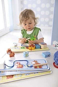 HABA On The Farm Threading Game with 10 Chunky Wooden Lacing Figures & 4 Templates (Made in Germa... | Amazon (US)