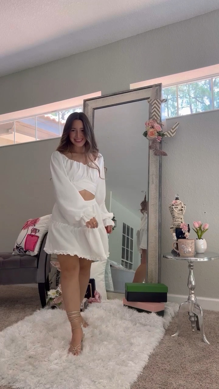 Got this gorgeous white matching set from Amazon and it makes the perfect summer outfit. Beach vacation outfit, resort wear, bachelorette party, etc. Under $35 and comes in so many color options. Also linking my Versace Jean purse which has been a huge fave of mine for the summer and an affordable Versace Jean lookalike. Love these gold lace up heels for the summer and my Madewell jewelry! Xoxo

Matching sets, summer ootd, sandals, tie-up, white dress, summer dress, mini skirt, tiered, curling wand, lipstick, lipgloss, shoulder bag, crossbody bag #LTKFind #LTKtravel #LTKshoecrush 

#LTKstyletip #LTKxPrimeDay #LTKitbag