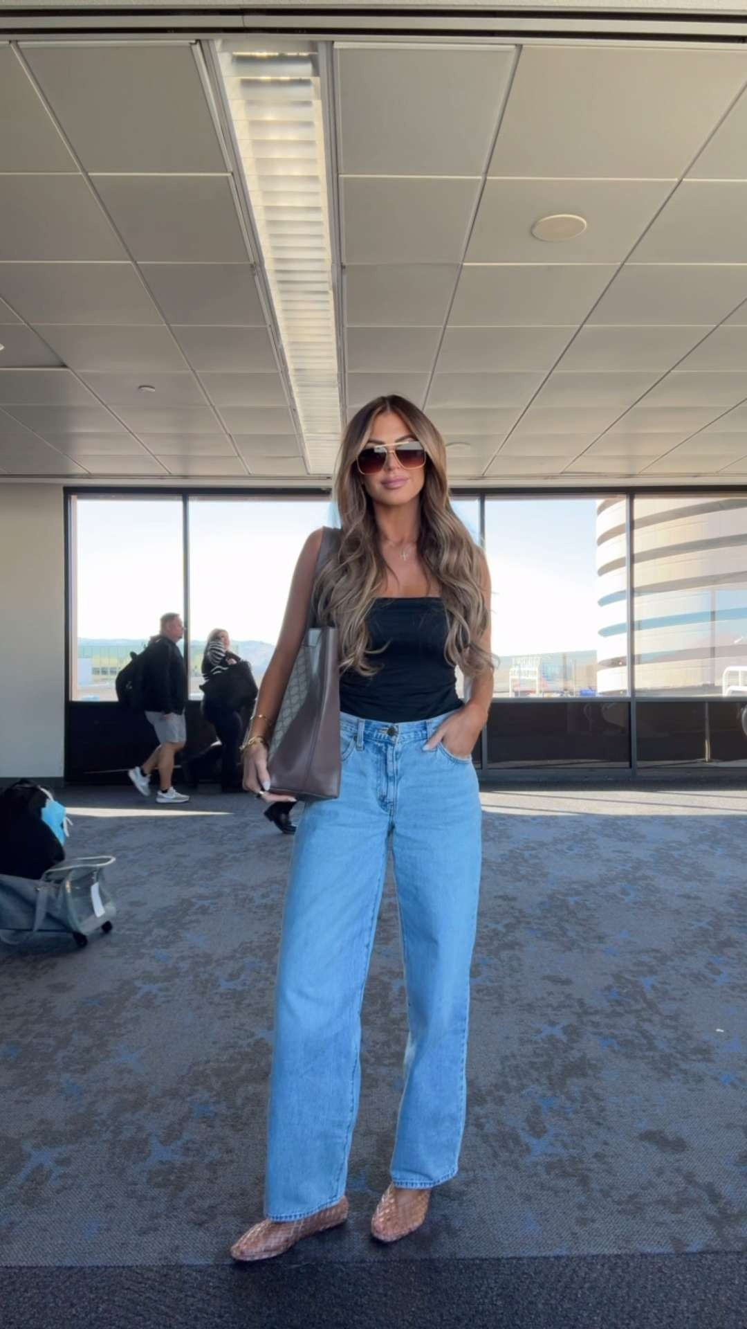 airport ootd! wearing a small top + 27 in the denim 🫶🏼 

 #LTKootd #LTKTravel