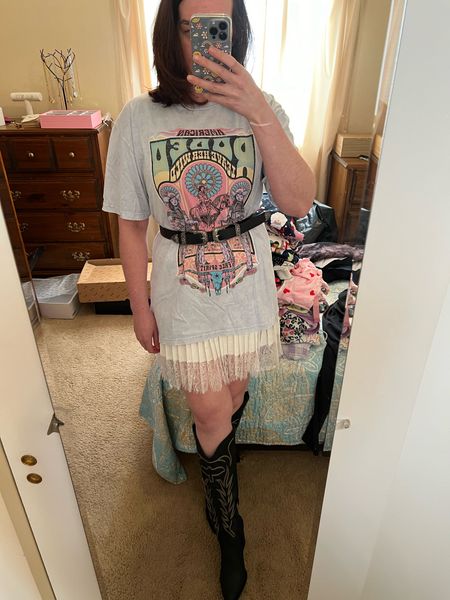 Country Concert Outfit - Light blue American Rodeo graphic tee (size small). White lace skirt (size small). Black cowboy boots (size 8.5). #countryconcert #countryconcertoutfit #whiteskirt #skirts #skirt #blackcowboyboots #cowboyboots #blackboots Summer Outfit 

#LTKSeasonal #LTKStyleTip #LTKFindsUnder100