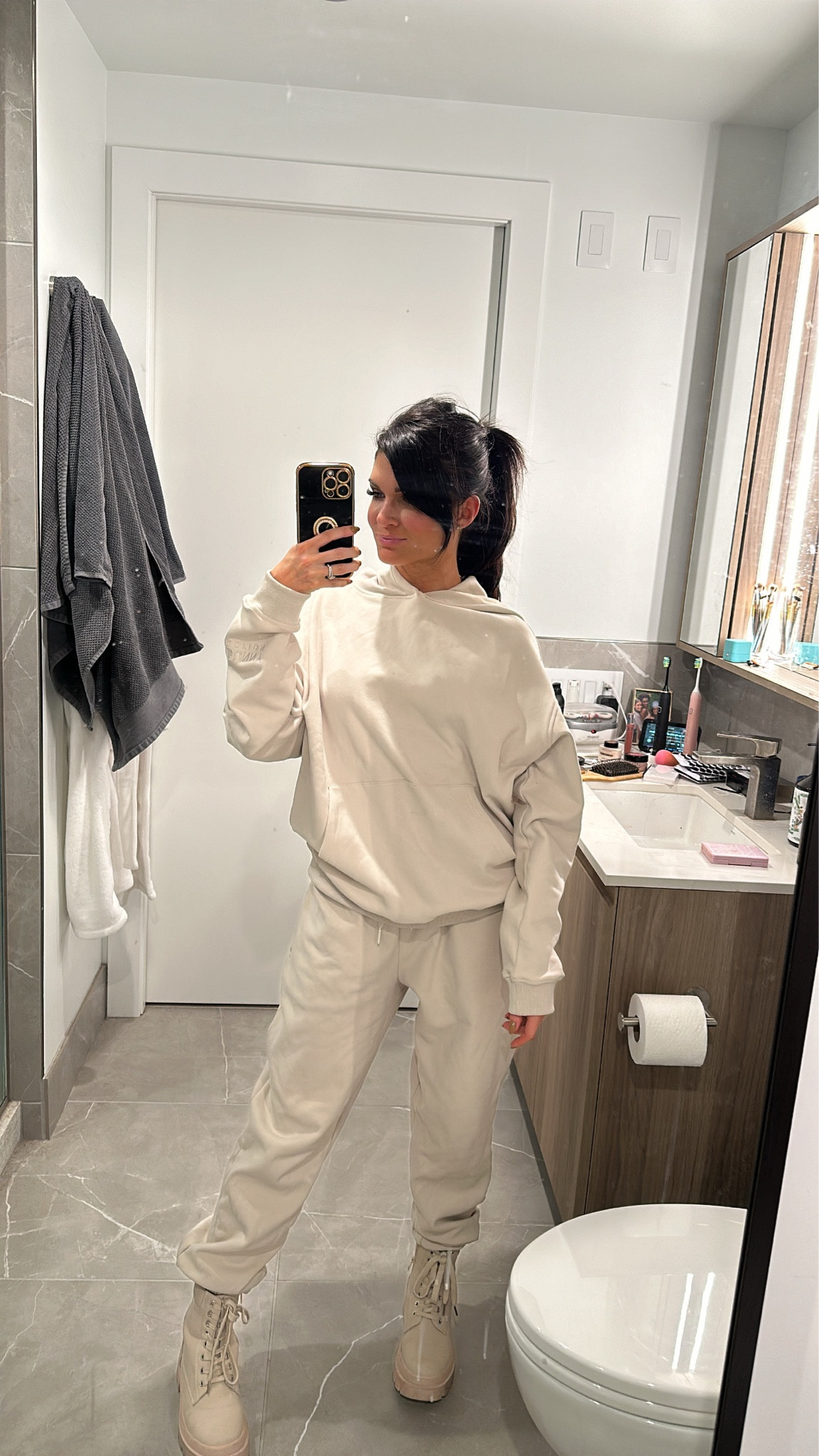 Crepe white matching sweat suit with white combat boots 

#LTKfitness #LTKstyletip #LTKtravel