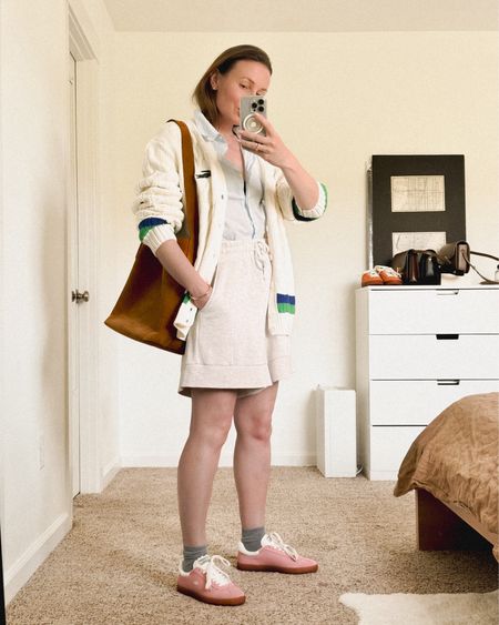 Look one or look 2? 
1. Varley shorts + blue cotton button down shirt + Lacoste oversized cable knit cardigan (on sale rn)  + Madewell bucket tote + Lacoste baseshot sneakers (in pink). 
2. Varley shorts + blue cotton button down shirt + madewell trucker jacket  + Bottega Veneta Cabat tote (in travertine ) + Lacoste baseshot sneakers (in pink).

#LTKFindsUnder100 #LTKSaleAlert #LTKSeasonal