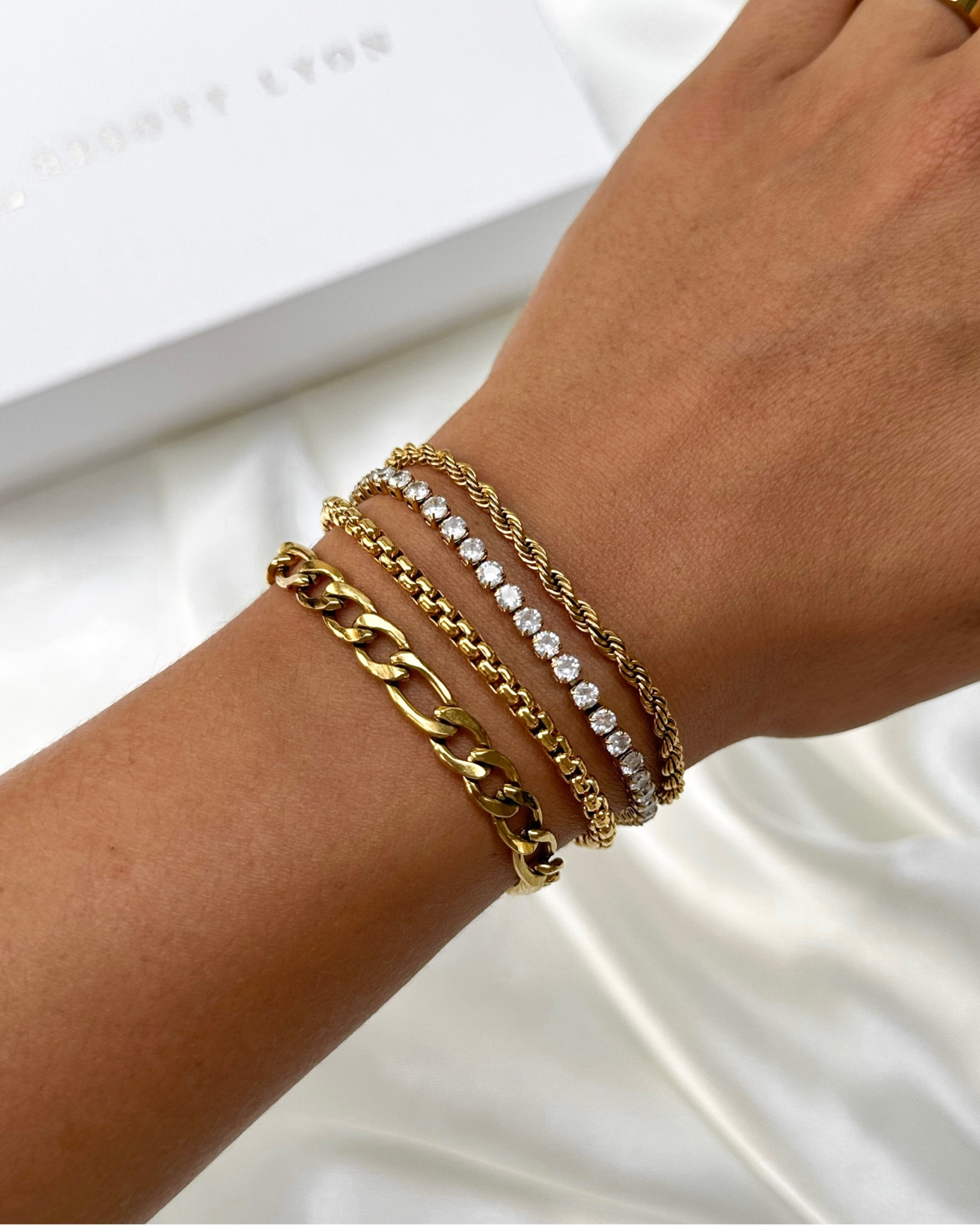 Gold and sparkly bracelet stack 

#LTKunder50 #LTKFind #LTKSeasonal