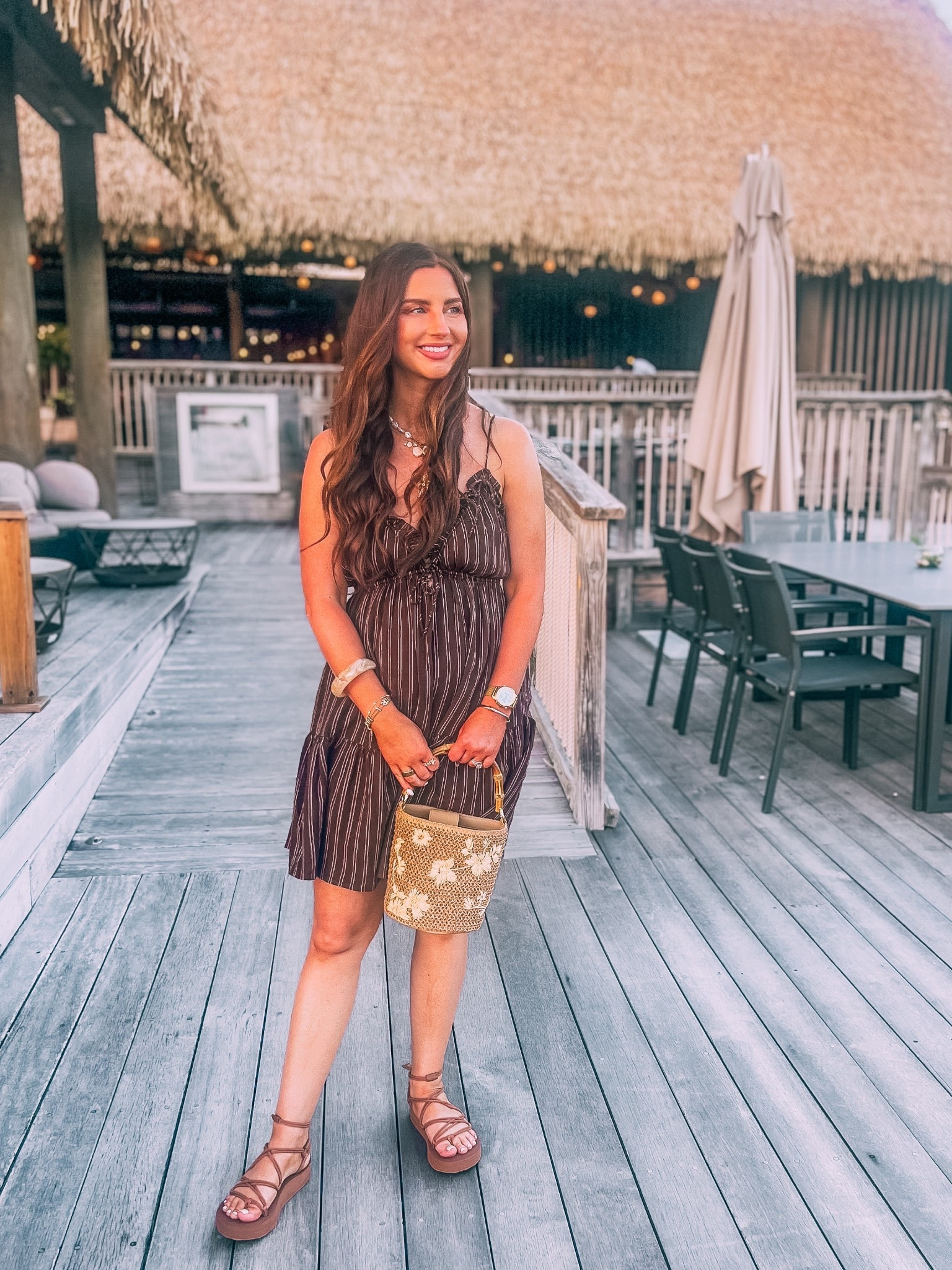 Triangle top brown striped dress-small
Floral rattan bucket purse
Brown gladiator sandals