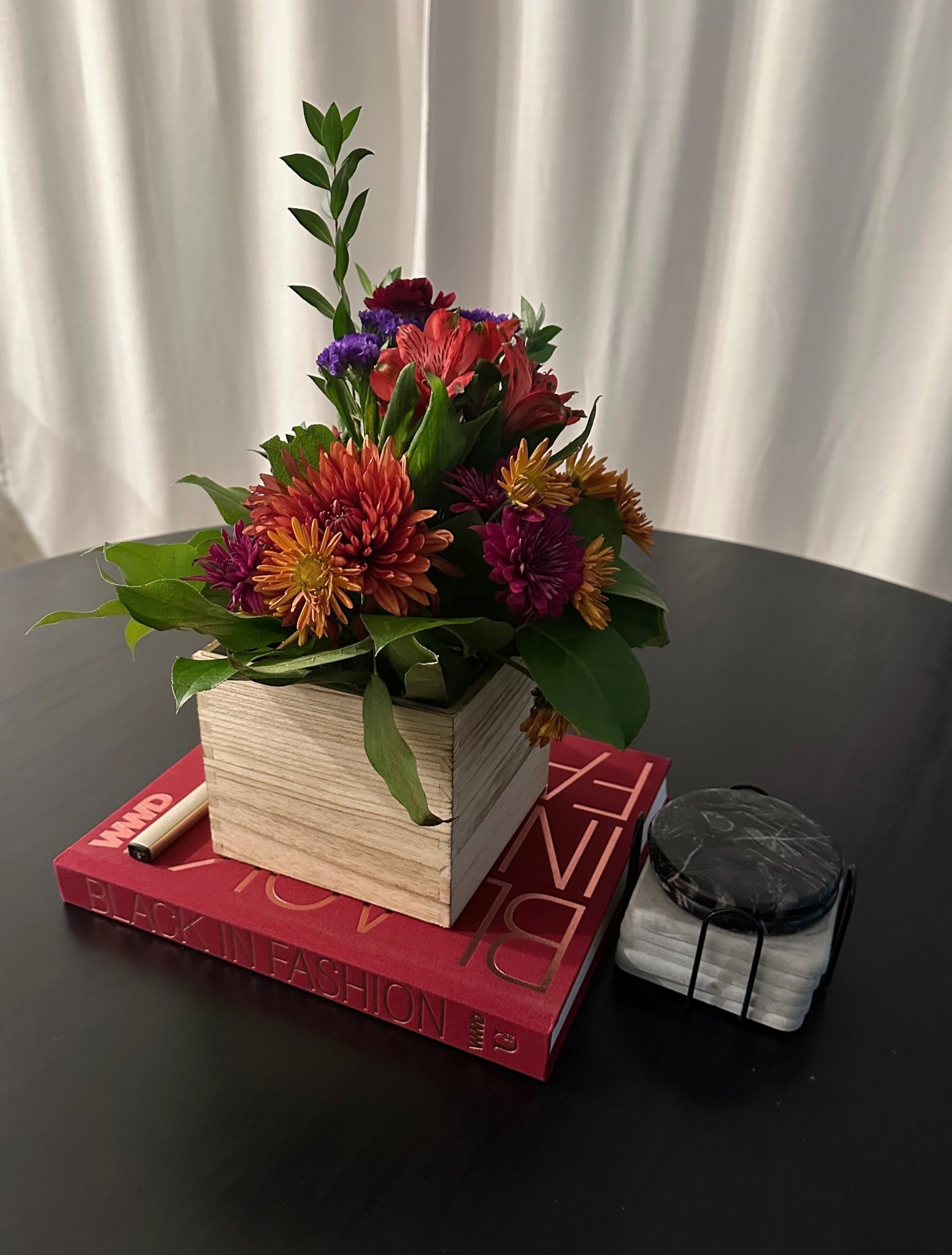 Coffee table book and coasters.

#LTKHome #LTKFindsUnder100