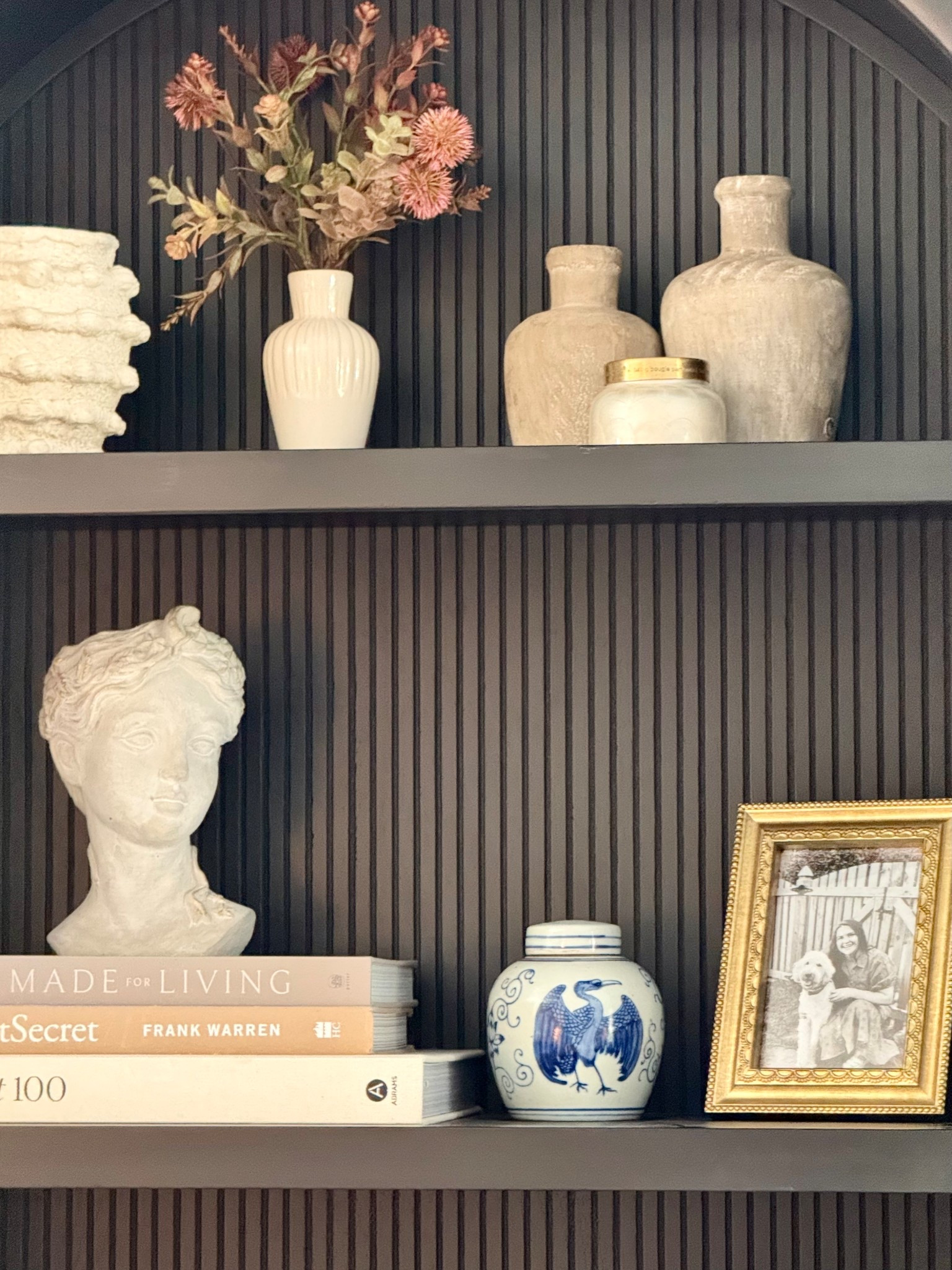 ✨ A little timeless detail goes a long way. I tucked this petite temple jar into my bookcase and I love how the hand-painted cranes bring just the right touch of charm + character! It’s one of those pieces that feels classic but collected — the kind you can mix in anywhere for an instant style upgrade ✨💙 #handmade #ethicallysourced

Would you keep it here with the books + photo, or move it up with the vases?

@alicelanehome exclusive


#LTKFindsUnder50 #LTKHome